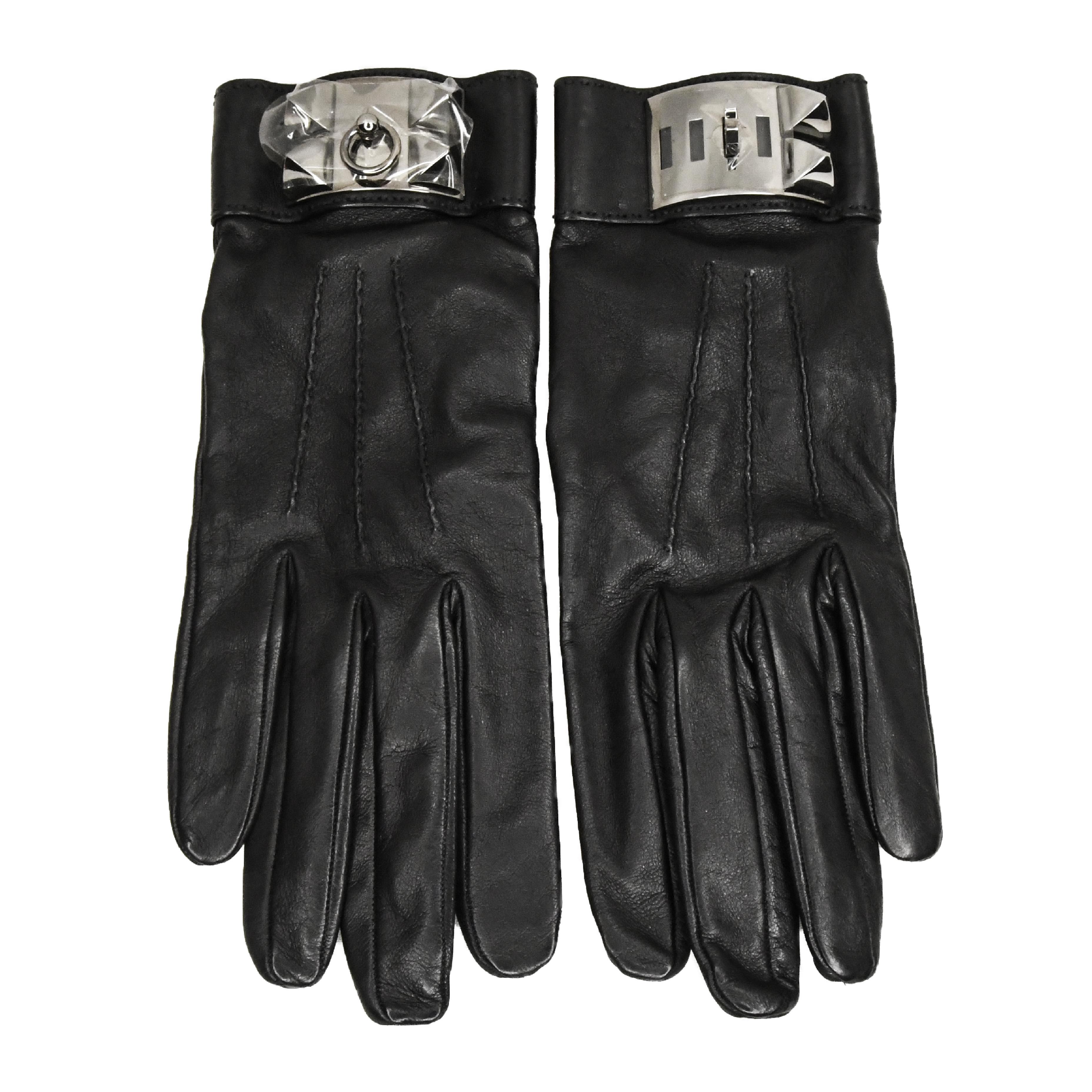 New In Box, black leather gloves are a must-have for any connoisseur of all things Hermès.  Features iconic Collier de Chien silvertone hardware sealed in original plastic.  Size 8.  New In Box.  Made in France.  