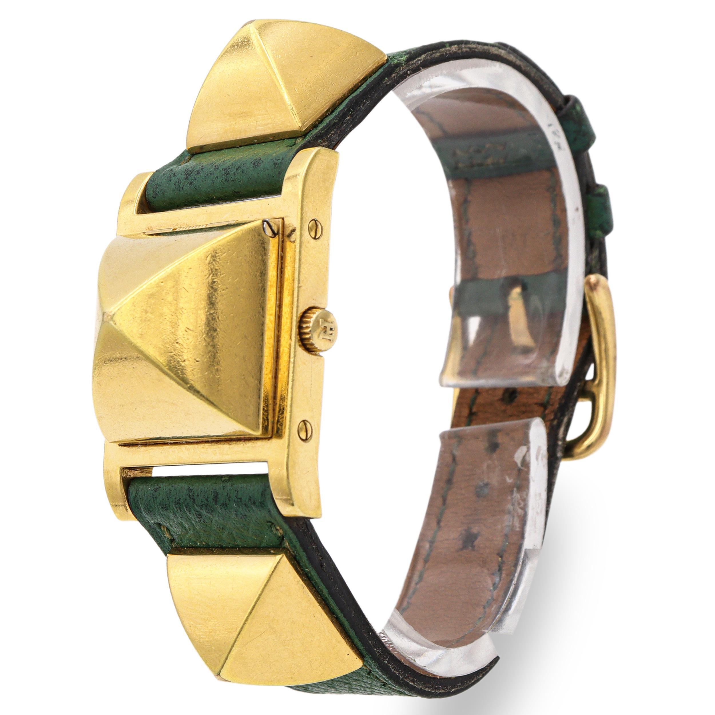 Reloj Hermès Medor de cuarzo chapado en oro con tapa piramidal para mujer en venta 1