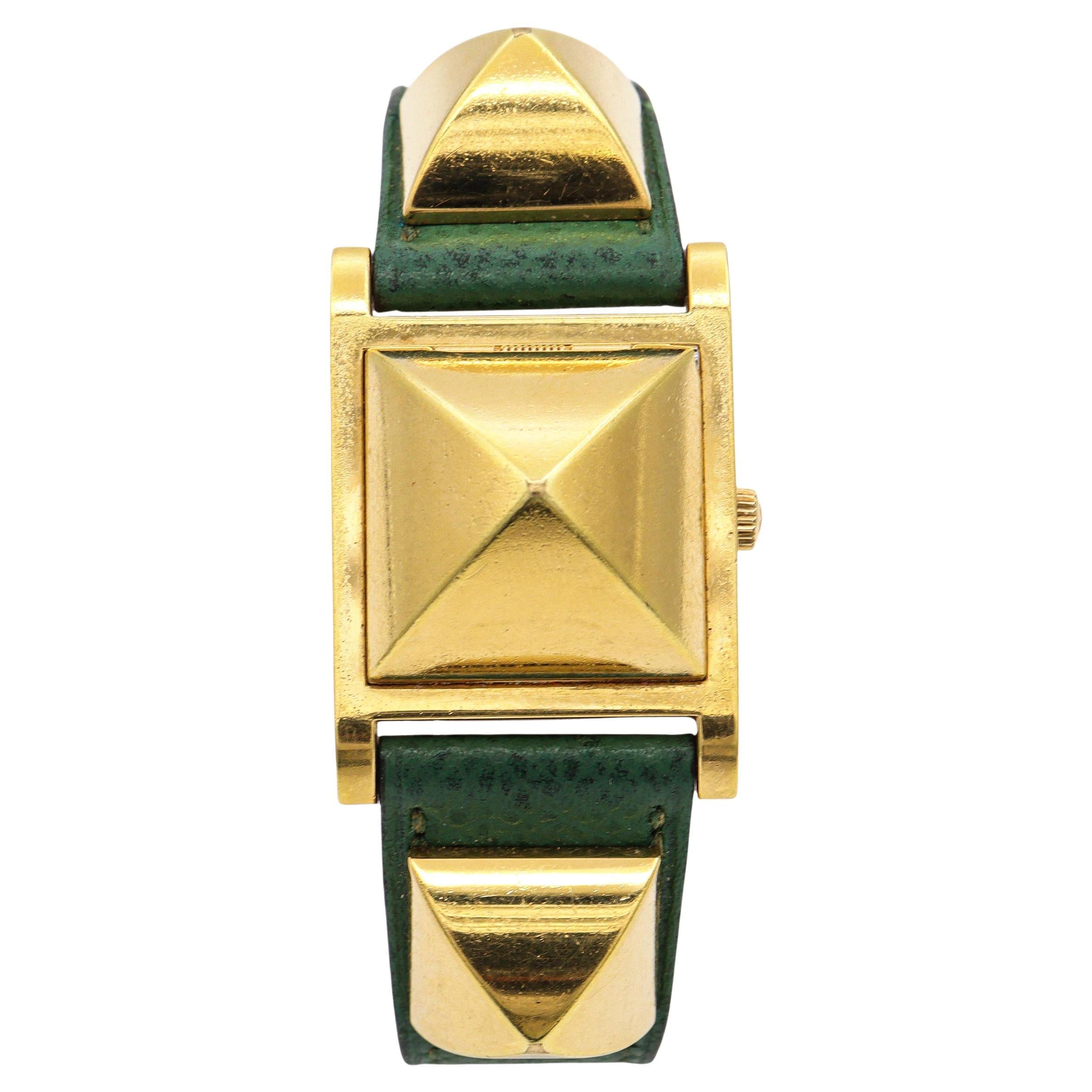 Hermès Montre à quartz pour femme Medor Pyramid Cover plaqué or