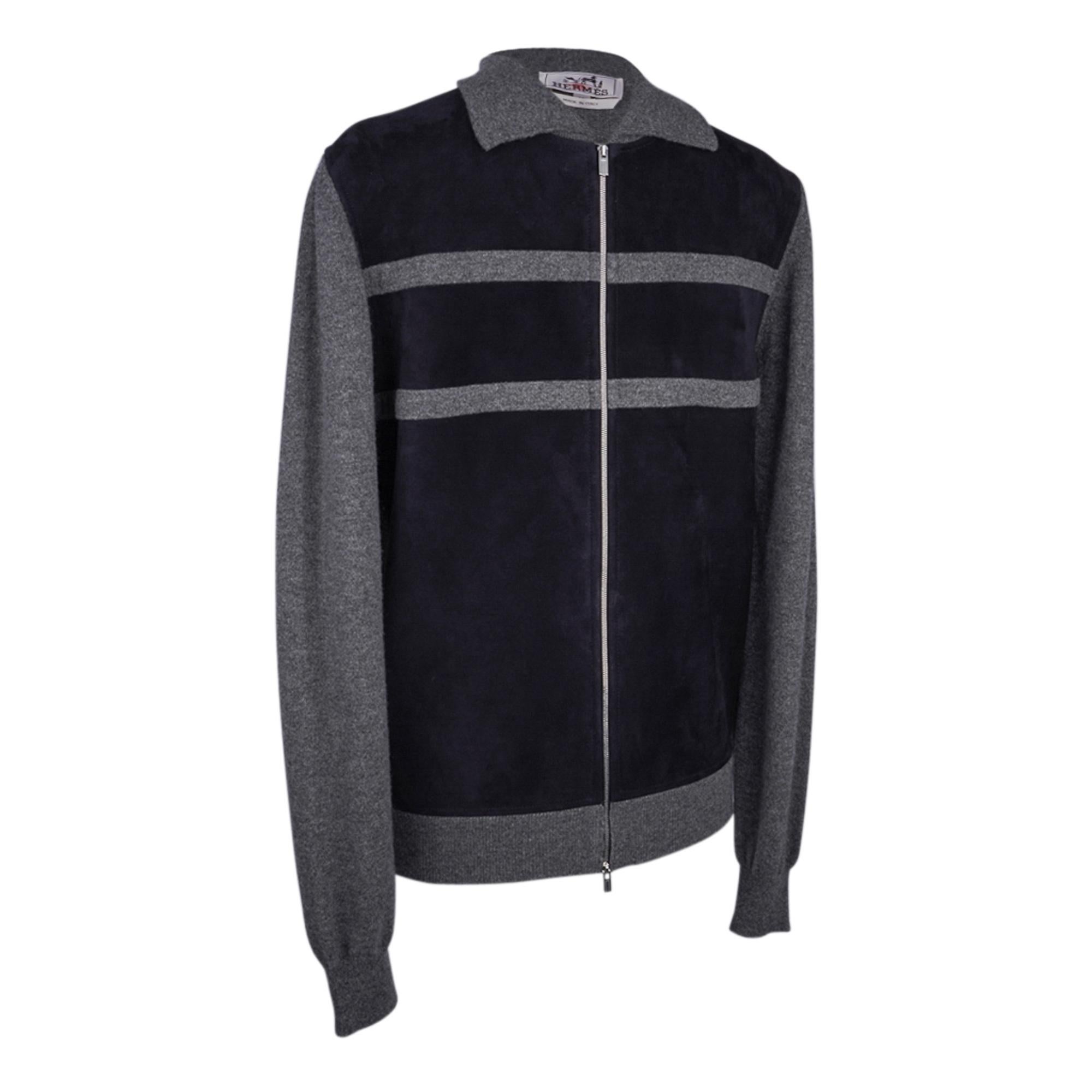 Guaranteed authentic Hermes Men's zip Bomber style cardigan / jacket featured in Suede and Cashmere.
Casual elegance in Bleu Marine Suede and Gray Cashmere.
Front suede panel has cashmere insets.
Sweater is collared and has full zip.
Palladium