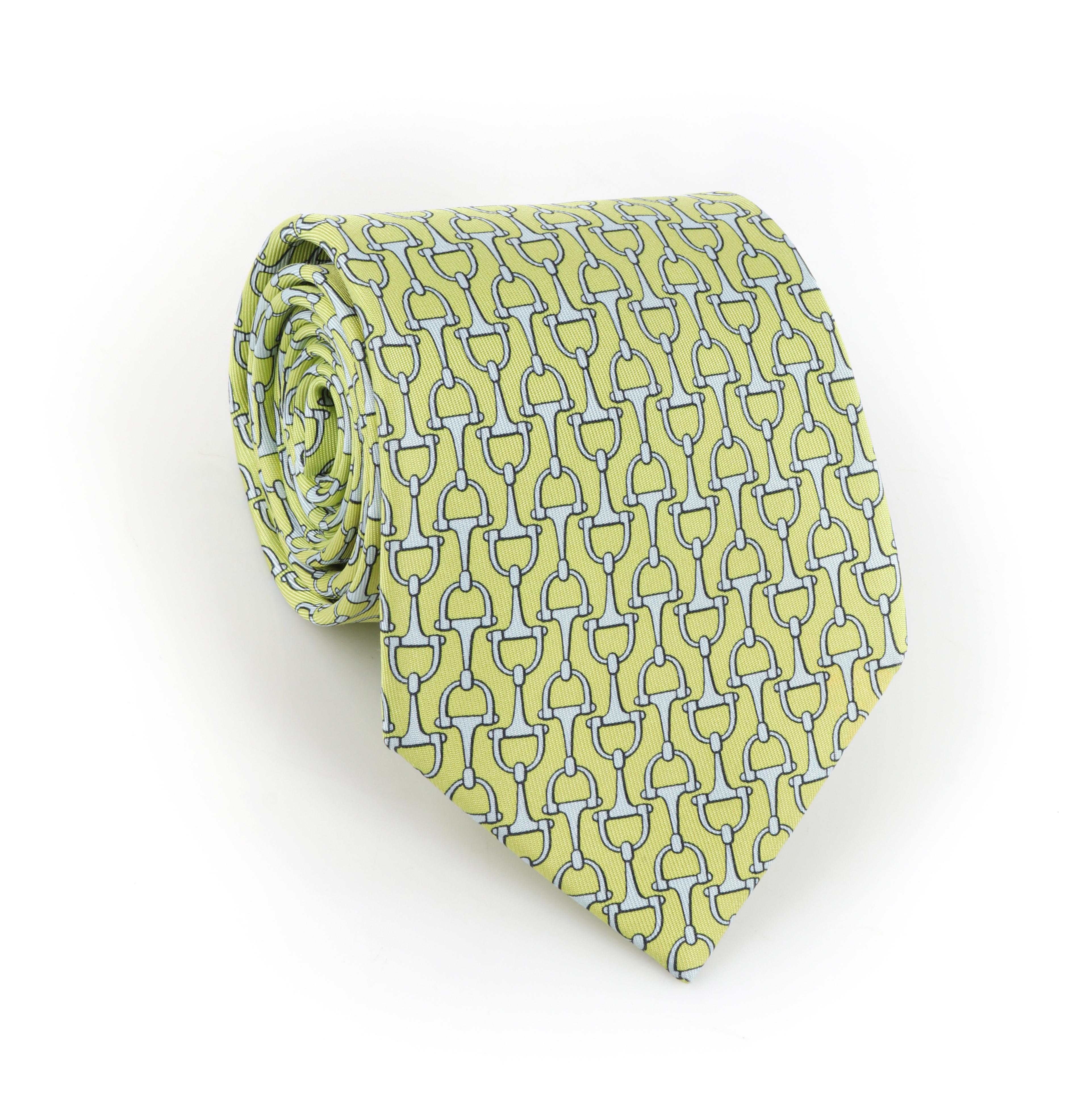 HERMES Mens Chartreuse Green Light Blue Horstbit 5-Fold Silk Necktie Tie 5214 IA
 
Brand/Manufacturer: Hermes
Style: 5-Fold necktie
Color(s): Chartreuse green, light blue, black
Lined: Yes
Marked Fabric Content: “100% Silk”
Additional Details /