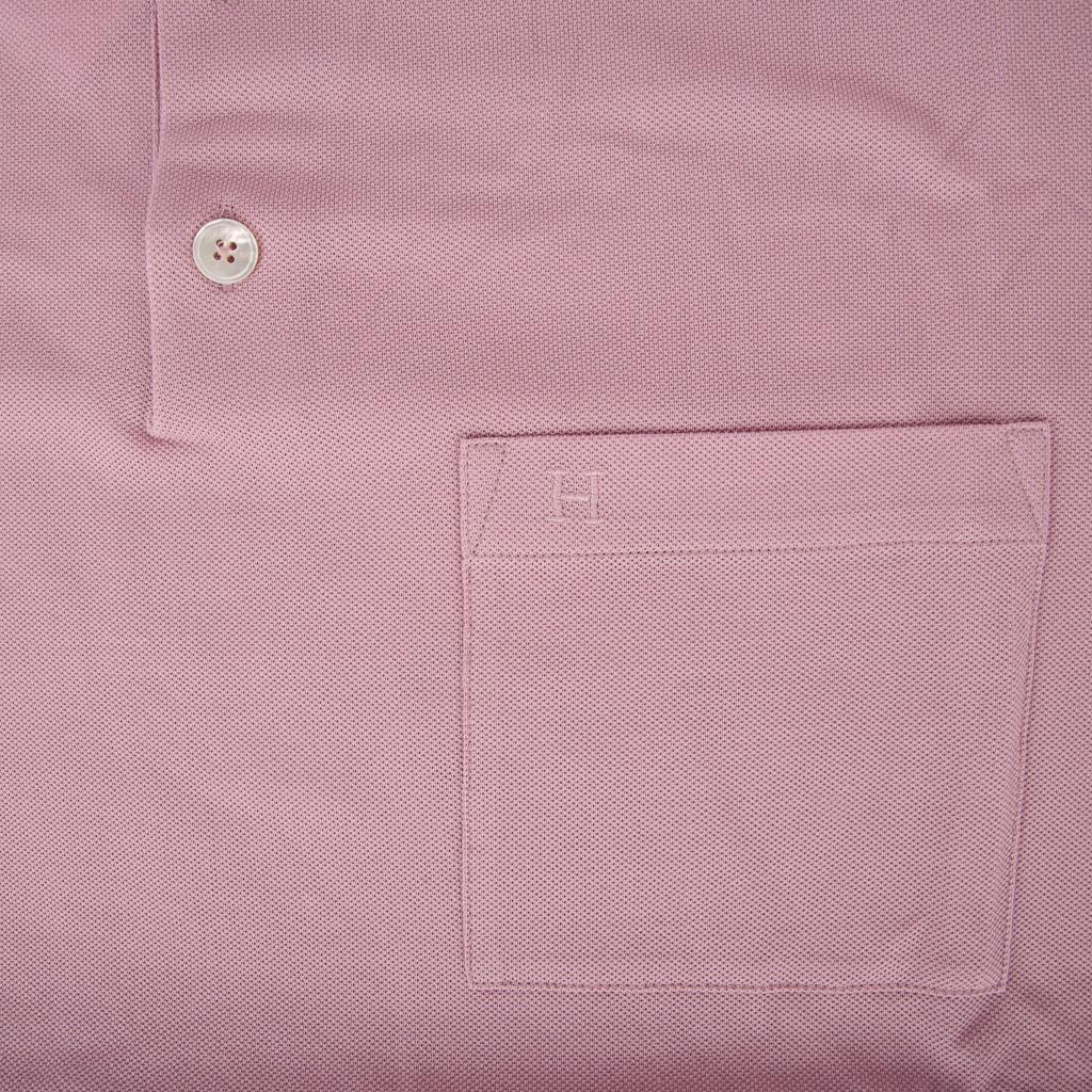 Mightychic offers an Hermes H H Embroidered Polo shirt featured in Rose Clair.
3 mother of pearl buttons.
H embroidery on chest pocket.
Short sleeve shirt. 
Classic style and effortless elegance.
Fabric is cotton pique. 
NEW or NEVER WORN 

SIZE 