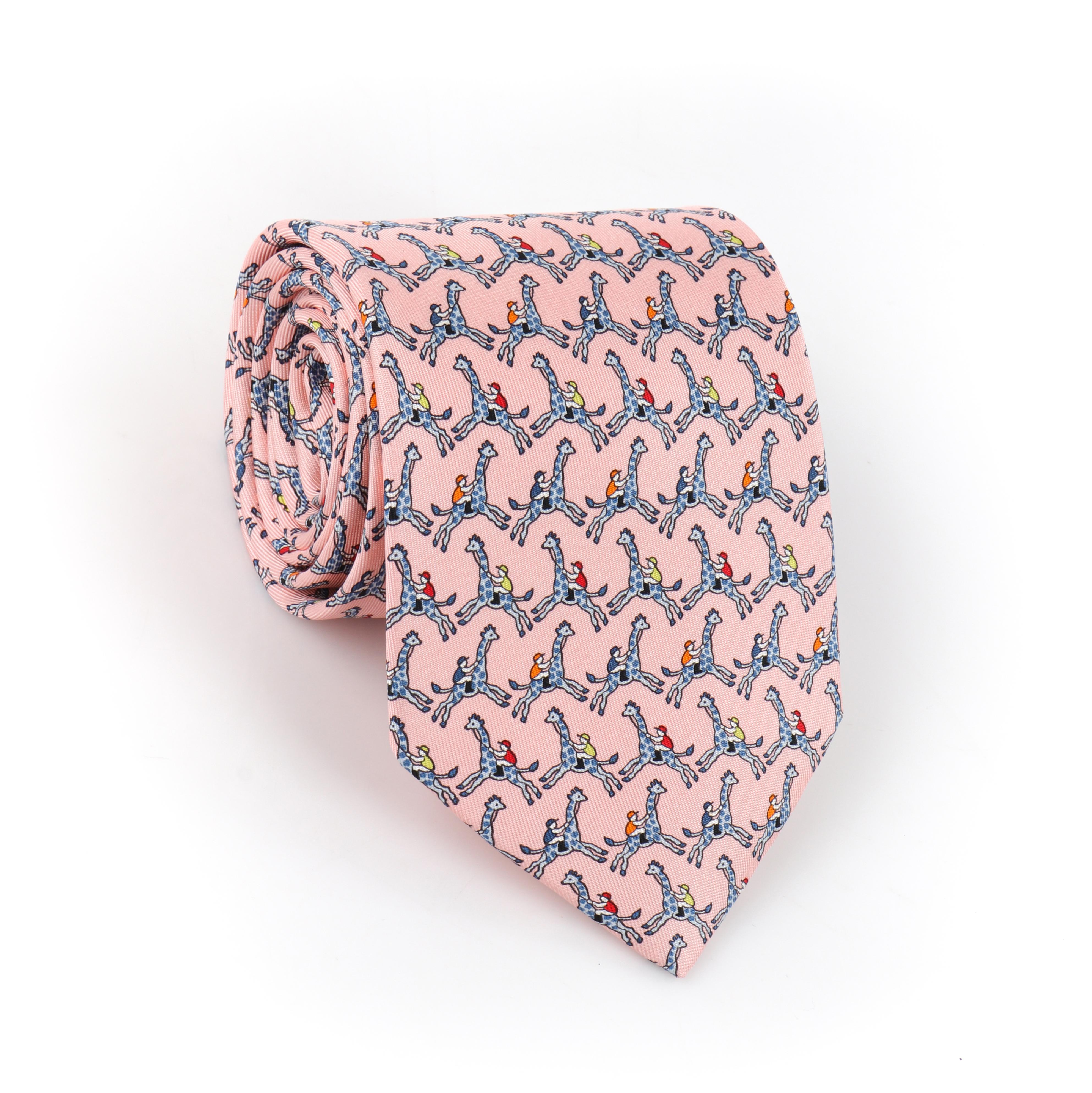 HERMES Men's Pink Blue Jockey Giraffe Riding 5-Fold Silk Necktie Tie 5440 FA
 
Brand/Manufacturer: Hermes Paris
Style: 5-Fold necktie
Color(s): Shades of pink, blue, orange, red, yellow
Lined: Yes
Marked Fabric Content: “100% Silk” 
Additional