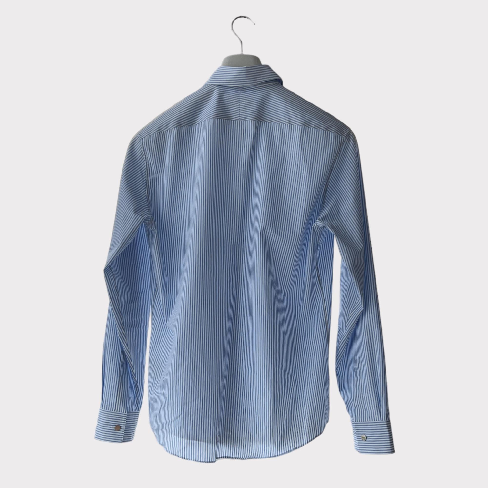 Shop this unique piece Hermès Men's 'Sportif Patch' Shirt in size 39 EU. It is handmade from 100% cotton with unique patches. Each shirt has been custom designed with a different pattern and only 1 available for each size. 

Brand: Hermès

Colour: