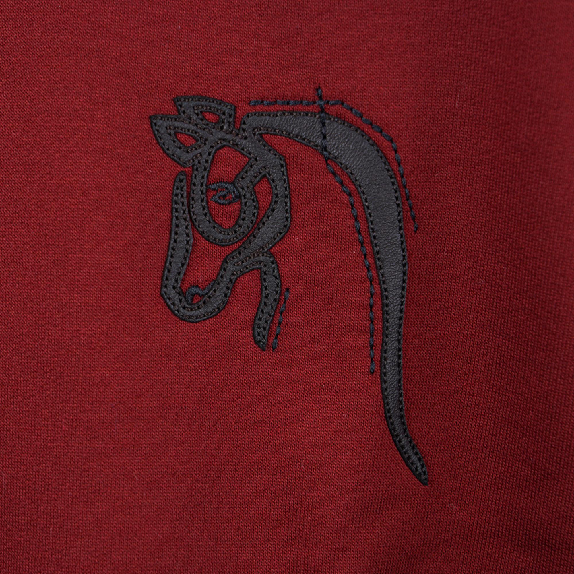Mightychic offers an Hermes Mini Patch Cuir T-Shirt featured in Rouge H.
Depicts a cheval au trait, a draft horse, in lambskin leather.
Short sleeve T with crew neck.
Fabric is cotton.
NEW or NEVER WORN
final sale

SIZE M

TOP MEASURES:
LENGTH