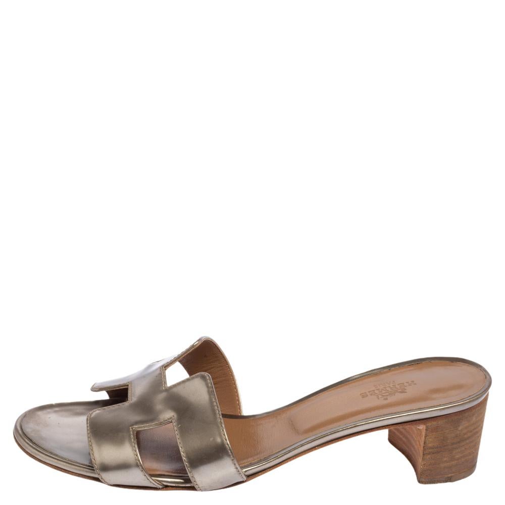 Put your best foot forward this season in these pretty Hermès sandals. These Oasis sandals have been crafted from high-quality patent leather in Italy and feature the iconic H on the vamps and block heels. The comfortable insoles are meant to