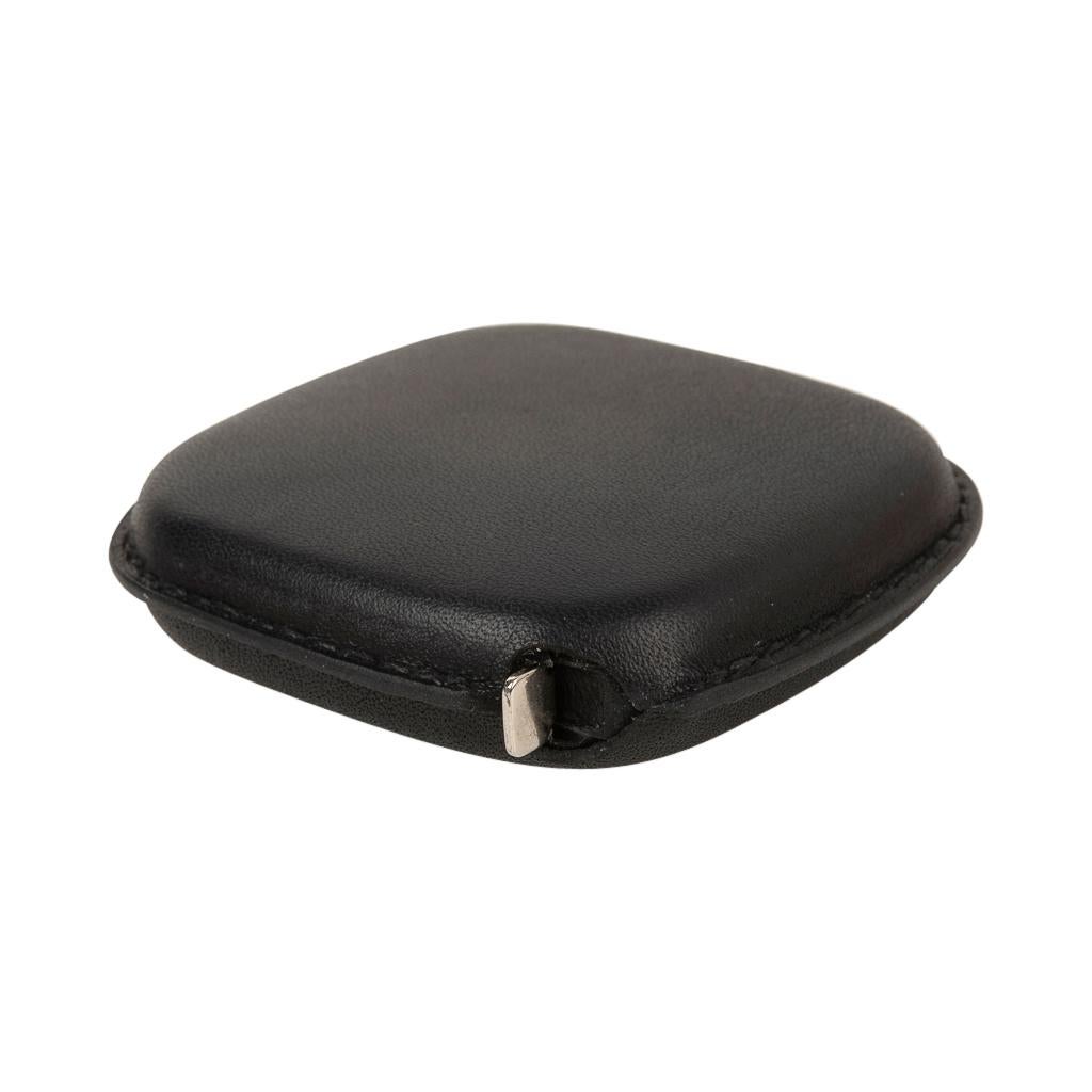 Guaranteed authentic Hermes Metre Ruban in the Pocket in Black Swift leather.
Measurements are in centimeters.
Hermes Paris stamped on rear.
Comes with signature Hermes box and pouch. 
New or Store Fresh Condition 
final sale
  
MEASURES: 
LENGTH 