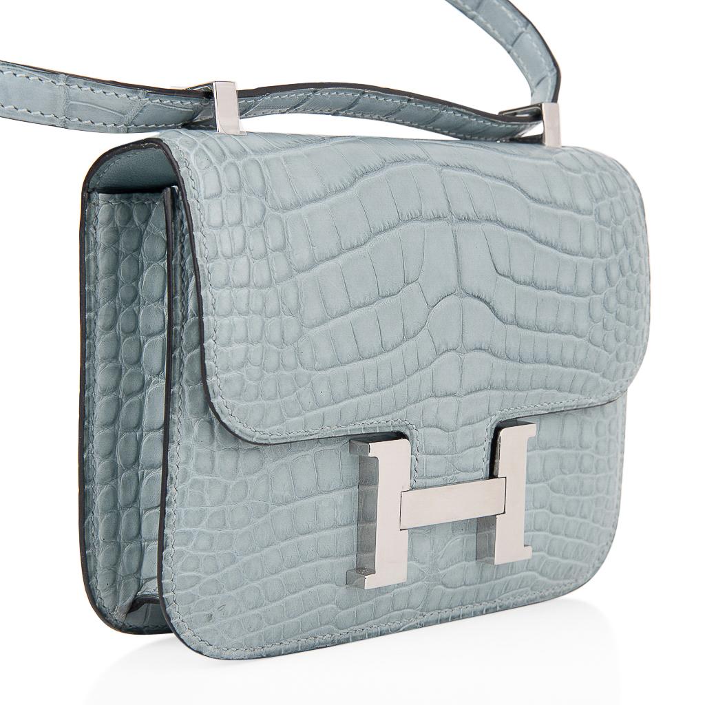 Guaranteed authentic exquisite limited edition Hermes Micro Constance features rare Ciel in Matte Alligator.
Fresh with Palladium hardware.
Perfect for year round wear.
This is a highly collectible Hermes bag.
Carried by hand, over the shoulder, or