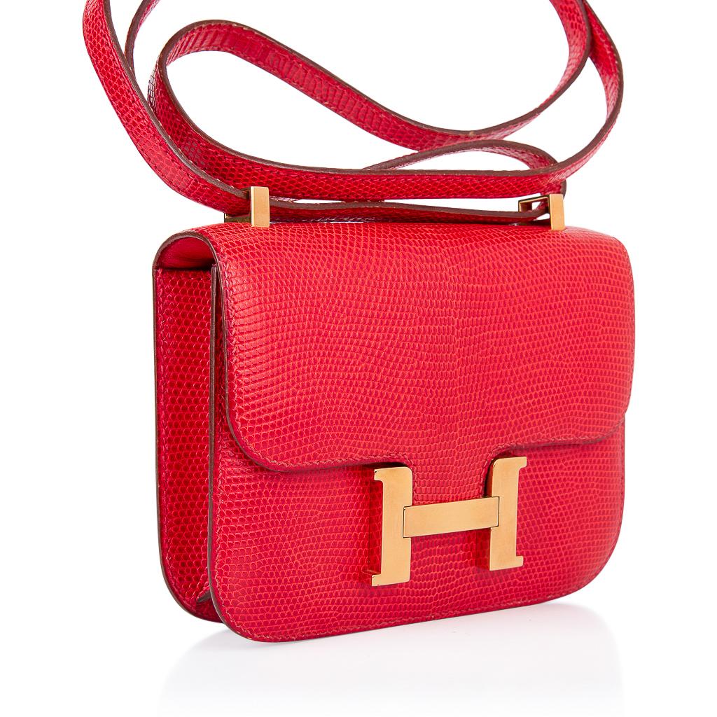Mightychic offers an exquisite limited edition very rare Hermes Micro Constance featured in vibrant Rouge Lizard.
Lush with Gold hardware.
Perfect for year round wear.
This is a highly collectible Hermes bag.
Carried by hand, over the shoulder, or
