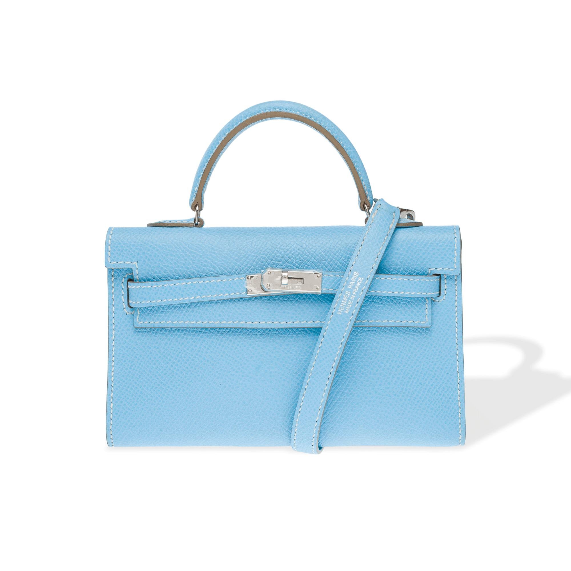 Exceptional​ ​&​ ​Extremely​ ​Rare​ ​Hermes​ ​Micro​ ​Kelly​ ​15​ ​cm​ ​sellier​ ​handbag​ ​strap​ ​in​ ​Bleu​ ​Céleste​ ​Epsom​ ​calf​ ​leather,​ ​with​ ​silver​ ​palladium​ ​metal​ ​hardware,​ ​blue​ ​leather​ ​handle,​ ​and​ ​blue​ ​leather​