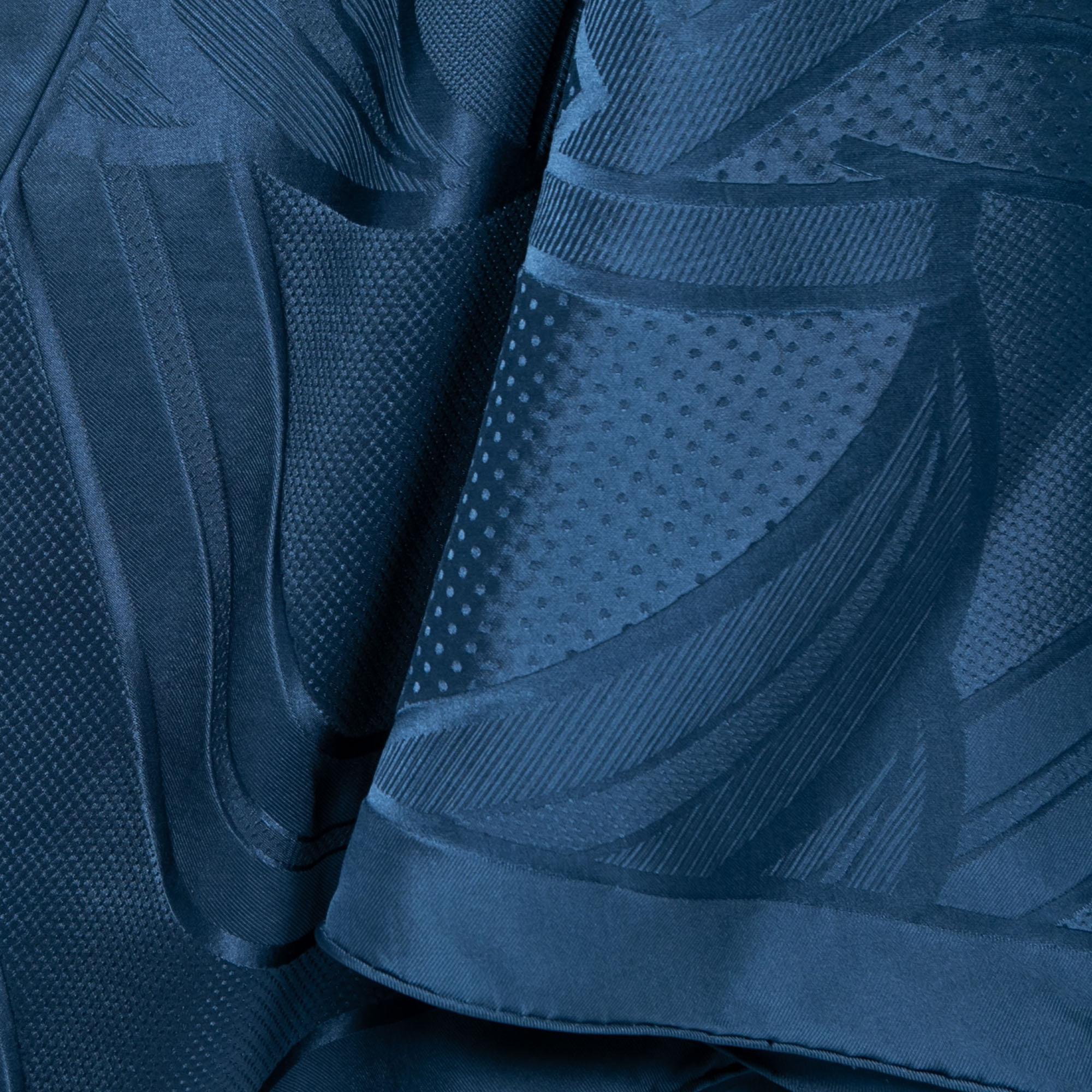 An essential Hermès accessory, the label's scarves are as iconic as any other creation from the brand and are collector's favorites. This rendition is carefully cut from luxurious silk portraying a midnight blue hue. There are endless ways to style