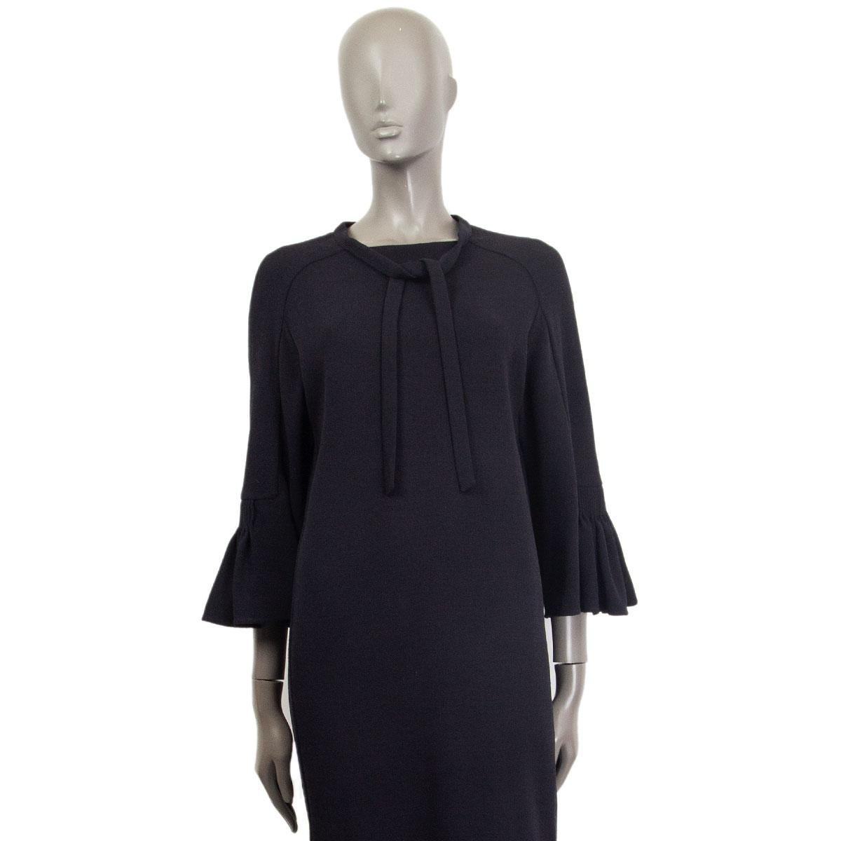 100% authentic Hermes oversized 3/4 ruched sleeve dress in midnight blue wool (100%) with tie detail around the neck. Lined in midnight blue silk (100%). Has been worn once and is in excellent condition. 

Measurements
Tag Size	36
Size	XS
Shoulder