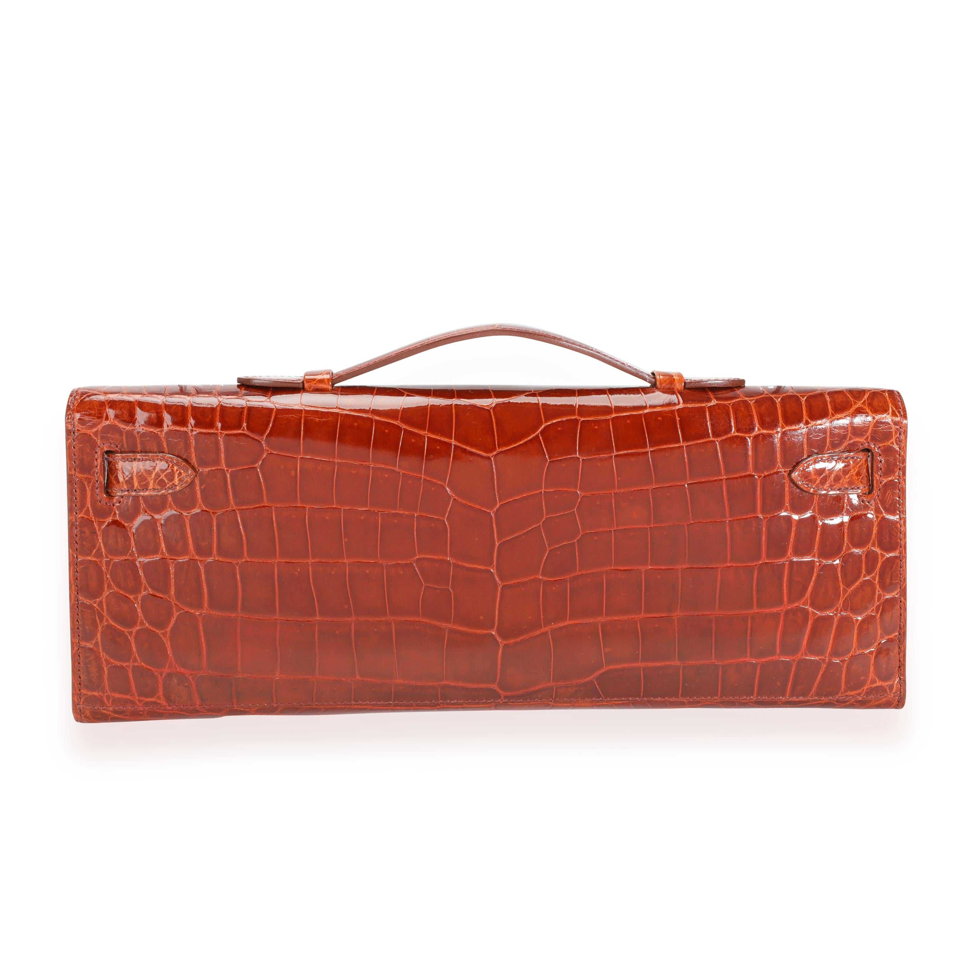 Rouge Hermès Miel Shiny Niloticus Crocodile Kelly Cut GHW en vente