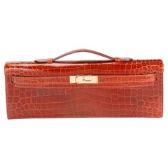 Hermès Miel Shiny Niloticus Crocodile Kelly Cut GHW