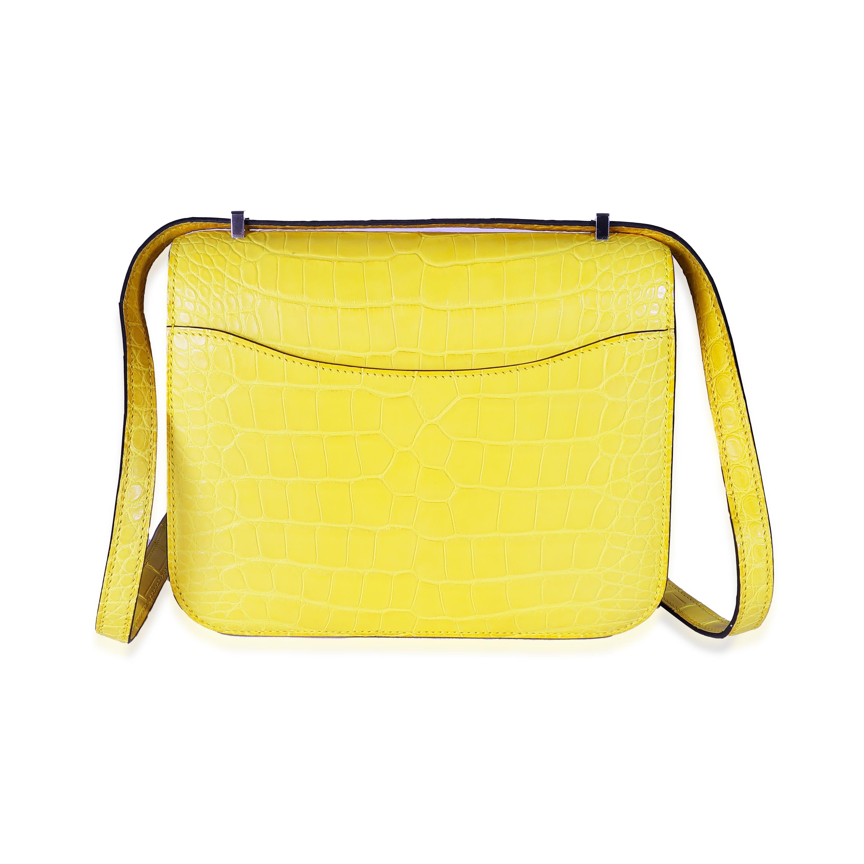 Listing Title: Hermès Mimosa Matte Mississippiensis Alligator Mini Constance III PHW
SKU: Z141634
MSRP: 33900.00 USD
Condition: Pre-owned 
Condition Description: In 1967, an Hermès bag was born. When Jean-Louis Dumas was the creative director of the