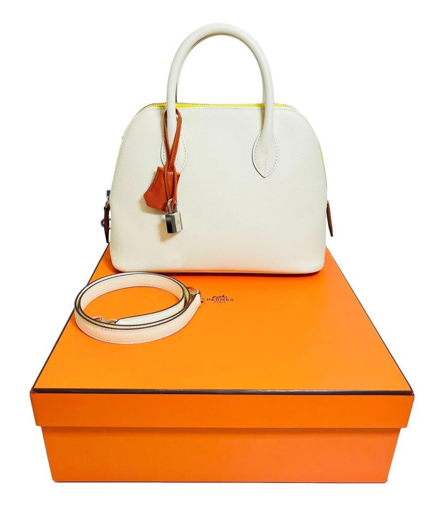 Must Have - Hermes Mini Bolide 1923 - 25 Tri-Colour Epsom Leather Bag

Ivory crossbody or handheld handbag crafted from Epsom calfskin leather and designed with dual rolled top handle.

Detailed with red clochette and bright yellow zipper tape