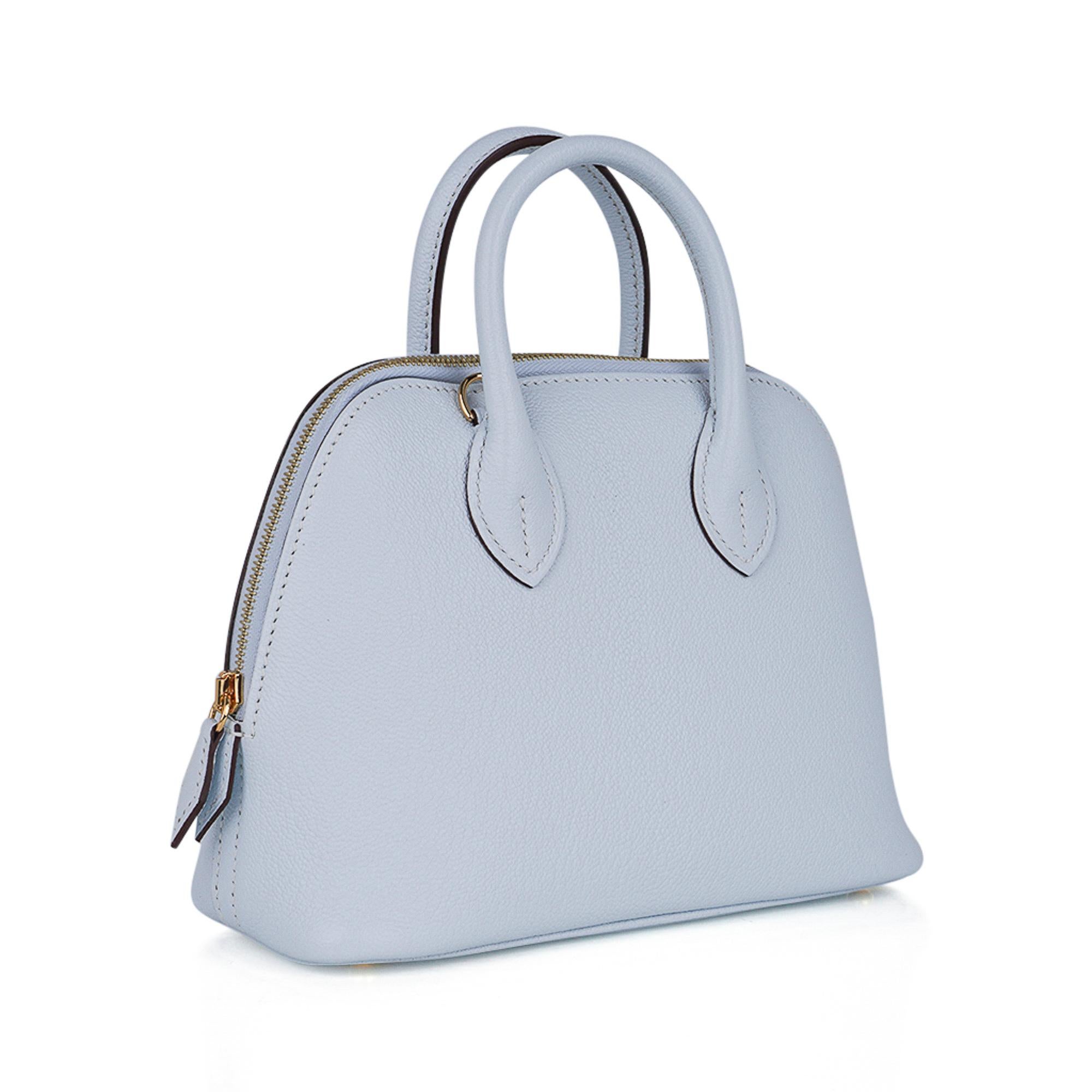 Mightychic offers an Hermes Mini Bolide 1923 featured in stunning Blue Brume. This is a collectors bag!
Charming 'baby' Bolide is a fabulous day to evening treasure.
Exquisite in Evercolor leather with gold hardware.
Comes with strap and