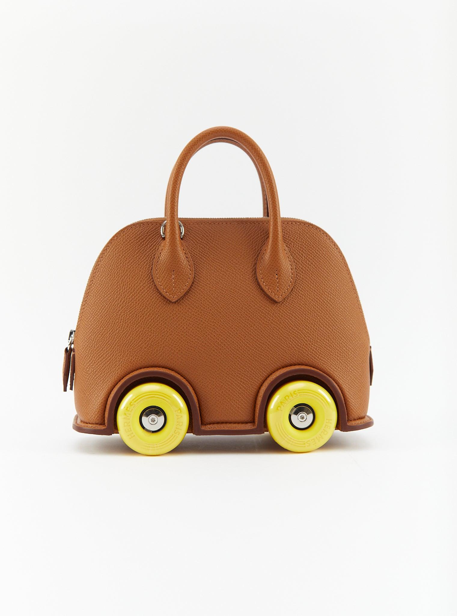 HERMÈS MINI BOLIDE ON WHEELS GOLD Epsom Leather with Palladium Hardware In Excellent Condition In London, GB
