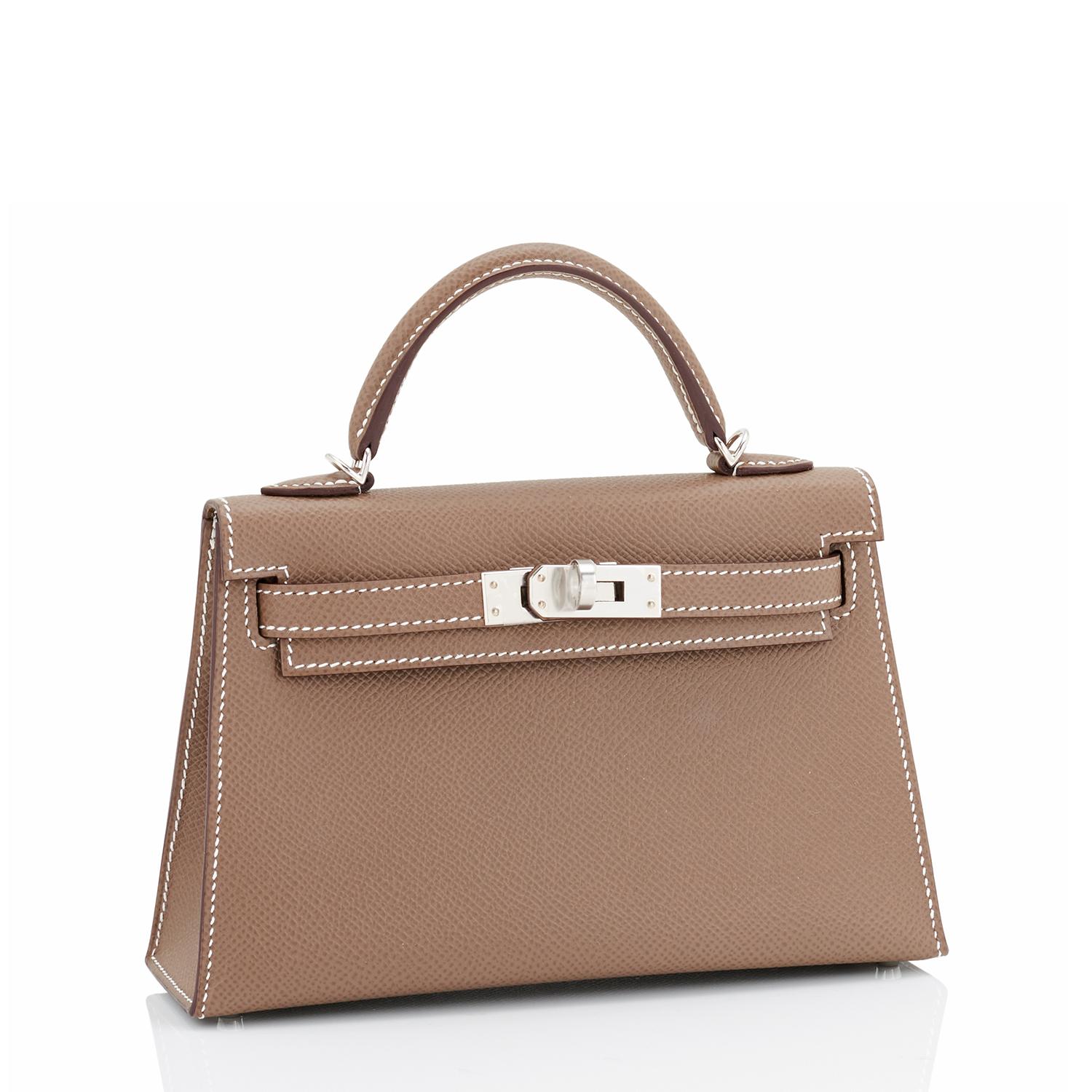 Hermes Mini Etoupe Kelly 20cm Epsom Bag New in Box
Brand New in Box.  Store Fresh. Pristine Condition (with plastic on hardware)
Perfect gift! Comes full set with shoulder strap, sleepers, and orange Hermes box.
Etoupe (Taupe) is the quintessential