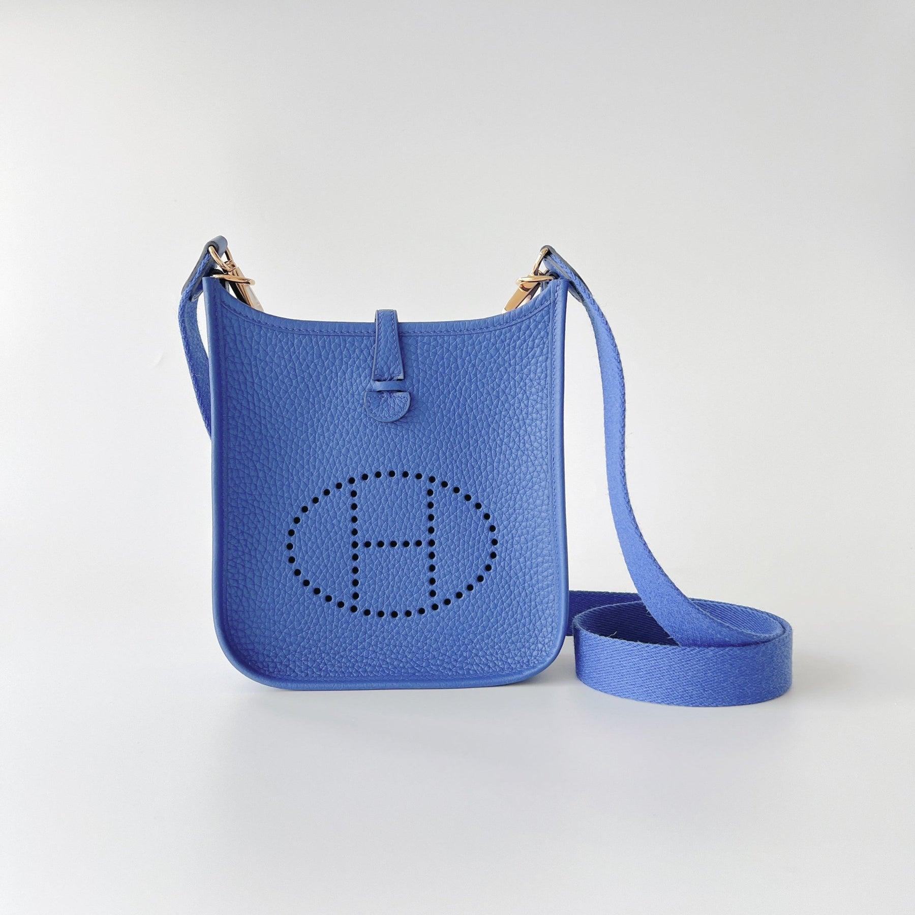 The Hermes Mini Evelyne 16 in Bleu Royal is a casual design that can be used for your everyday routine. This is the smallest size Hermes Evelyne bag and is made from handcrafted Royal Blue Clemence leather, making it harder to scratch or become