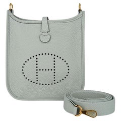 Hermes Mini Evelyne TPM Gris Neve Crossbody Tasche Clemence Leder Gold Hardware