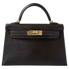 Sac Hermès Mini Kelly 20 en cuir Bai Brun Veau Madame et Permabrass HW
