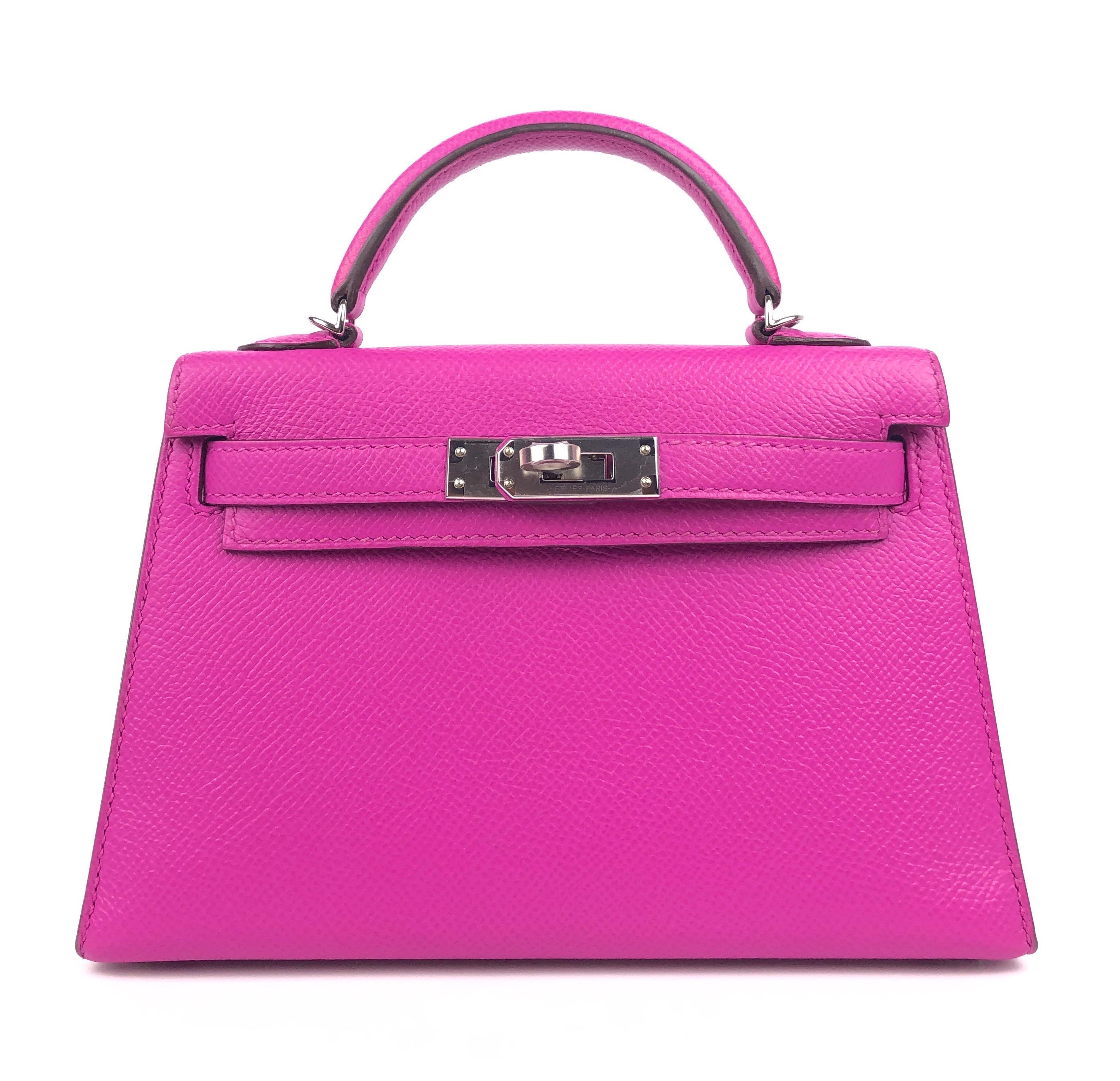 New Hermes Mini Kelly 20 Magnolia Pink Purple Epsom Leather Palladium Hardware. C Stamp 2018. As New from collectors closet with All Plastic. Has been displayed and handled but never worn out. 

Shop with Confidence from Lux Addicts. Authenticity