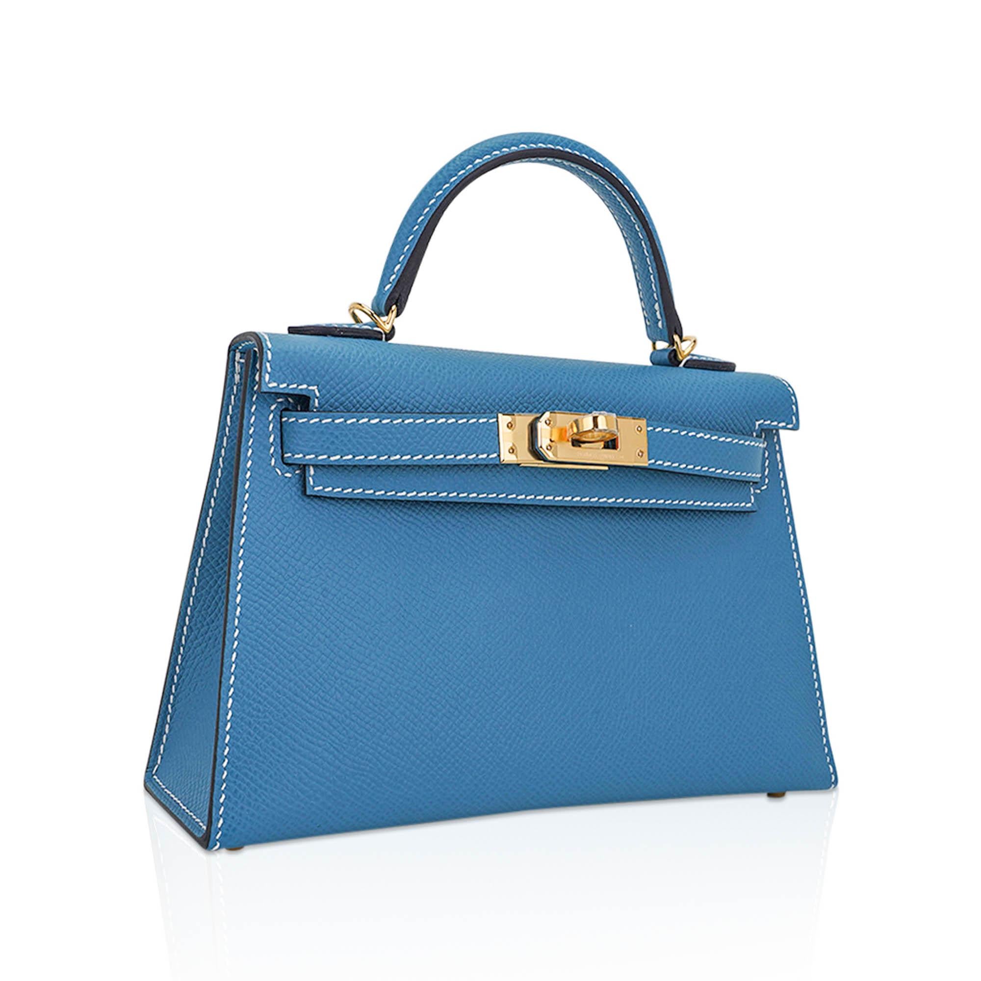 Mightychic offers an Hermes Kelly 20 Mini Sellier bag featured in New Bleu Jean.  
The iconic Hermes Blue Jean is finally reintroduced in limited quantity and is gorgeous for year round wear, and completely neutral.
Espom leather accentuated with