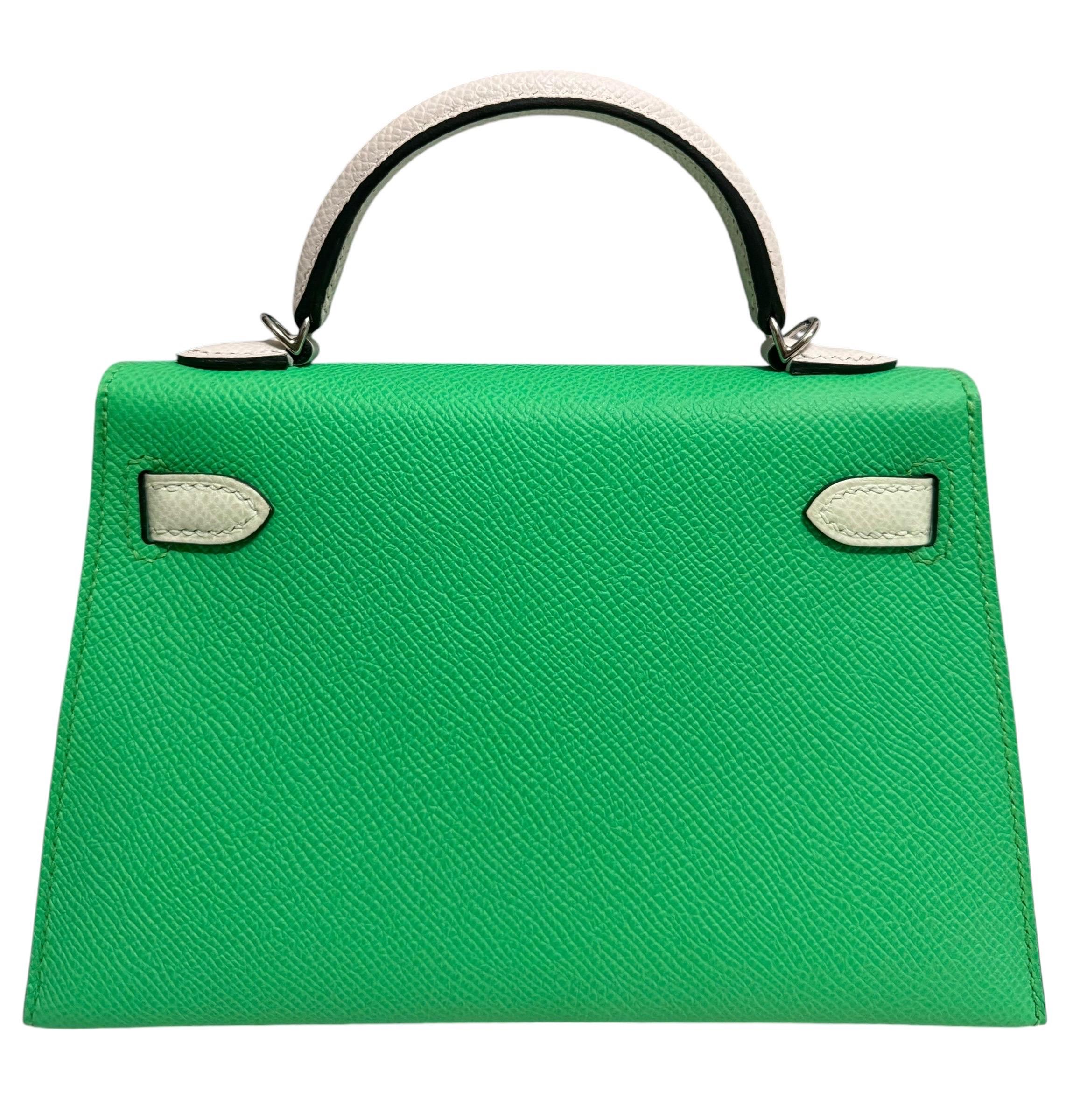 Rare and Most Coveted Hermes Mini Kelly 20 Tri Color Vert Comics, Vert Fizz & Gris Pale Epsom Leather Complimented by Palladium Hardware. 
U Stamp 2022. 
Includes all Accessories and Box.
Lux Addicts is a company based in Miami, Florida,
