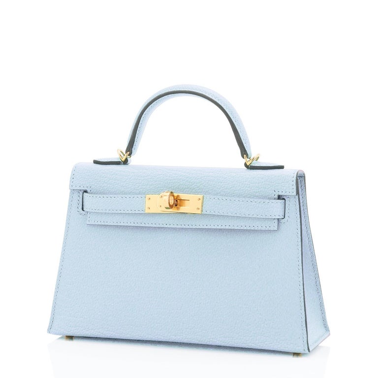 Hermes Blue Brume Kelly 20 cm Chevre Gold Hardware U Stamp, 2022
Just purchased from Hermes store; bag bears new 2022 U Stamp.
Brand New in Box. Store Fresh. Pristine Condition (with plastic on hardware)
Perfect gift! Comes full set with shoulder