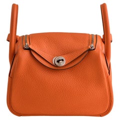 Hermès Mini Lindy 20 Naranja Clemence Piel Paladio Herrajes
