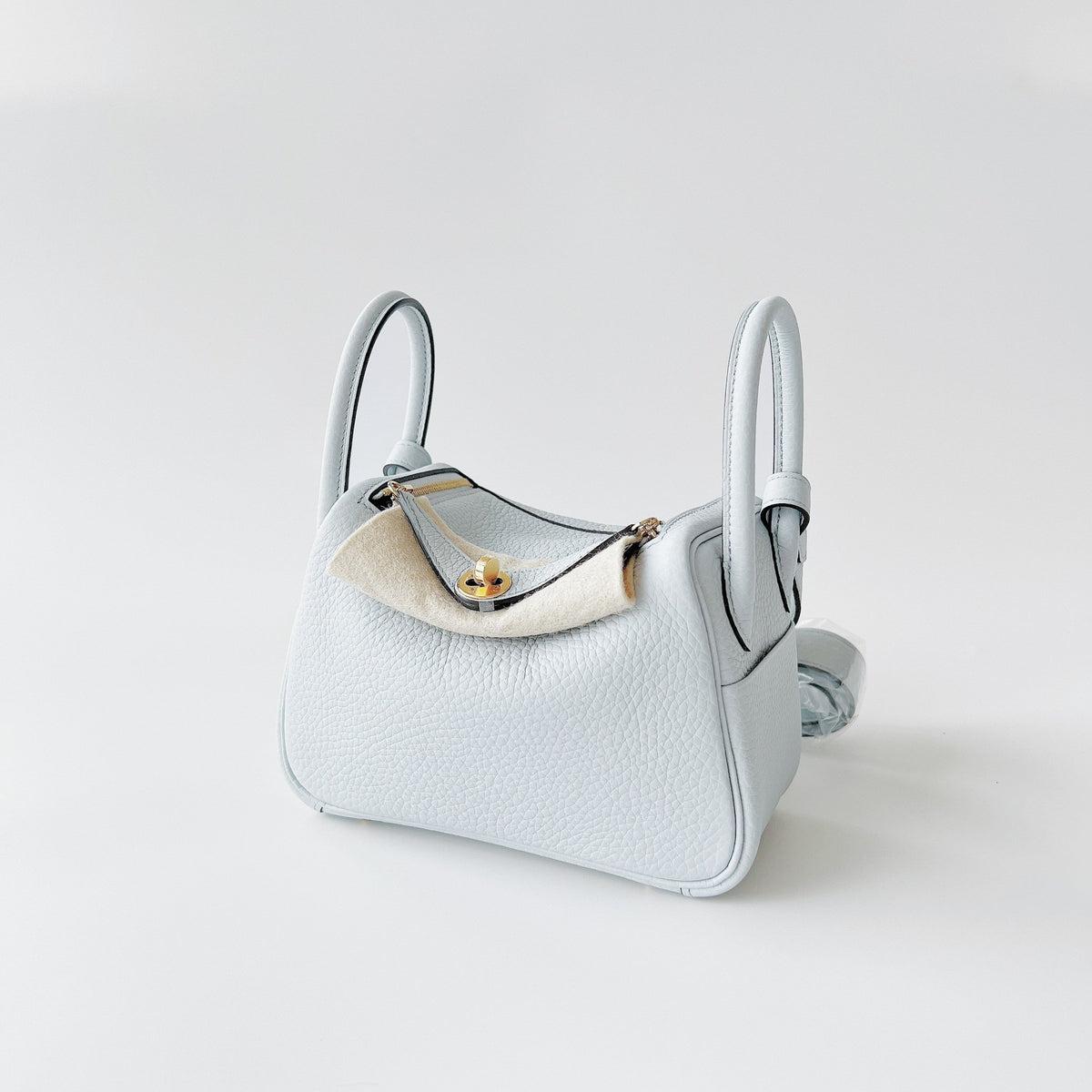 A perfect bag for any season. We have got an amazing 2022 Hermes Mini Lindy in Bleu Pale with Gold Hardware. The Mini Lindy comes in Clemence leather. 

Height: 13cm Width: 20cm Depth: 9cm Handle Drop: 5cm Strap Drop: 50cm

Condition: Brand New,