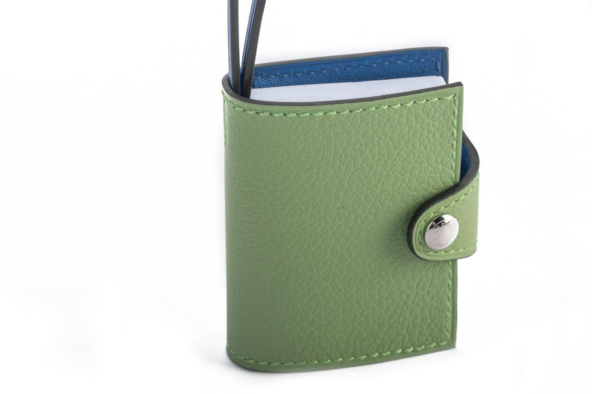 Hermes just released mini notebook bag charm. Verso combination of vert criquet and blue de France. New in box.