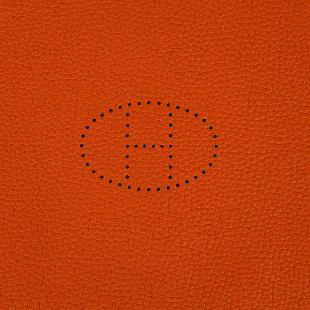 Mightychic offers an Hermes Mises et Relances change tray with perforated Evelyn H.
Beautifully crafted featuring Orange Clemence leather.
Nickeled clou de selle snaps.
A beautiful desk or bedroom accessory.
Stamped Hermes Made in France.
New or