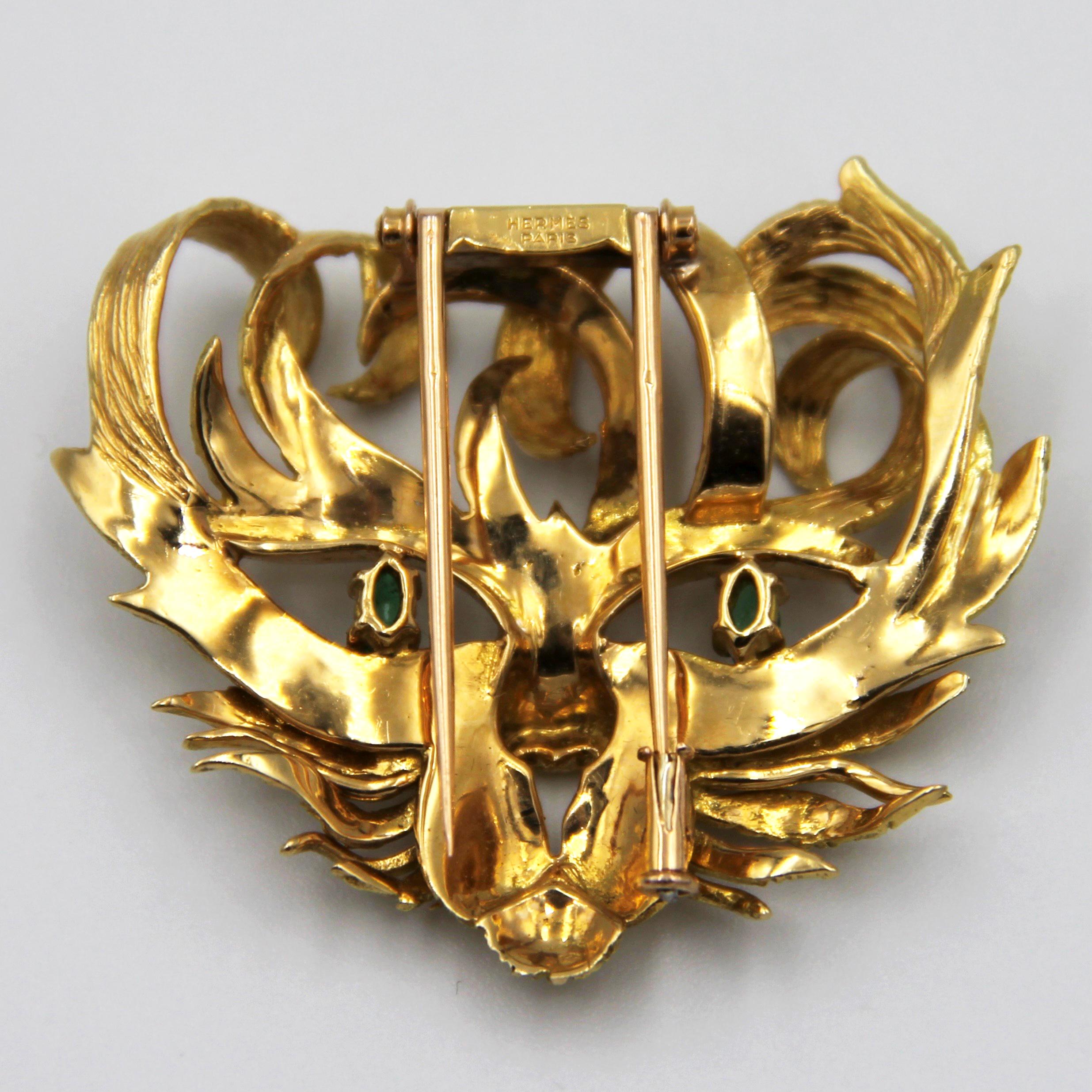 A unique 1960's brooch designed by Hermes from a drawing of Jean Cocteau , a famous French poet, writer and desginer . Mistigri means 'cat'in French . This Brooch measures 45mm x 40mm from front . It's eyes are perfect color emeralds . 