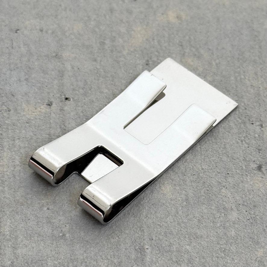 Authentic Hermès money clip in the shape of an 