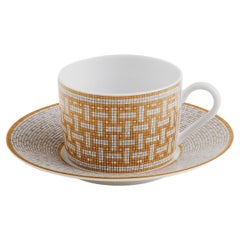 Hermes Mosaique au 24 gold tea cup and saucer Set of two