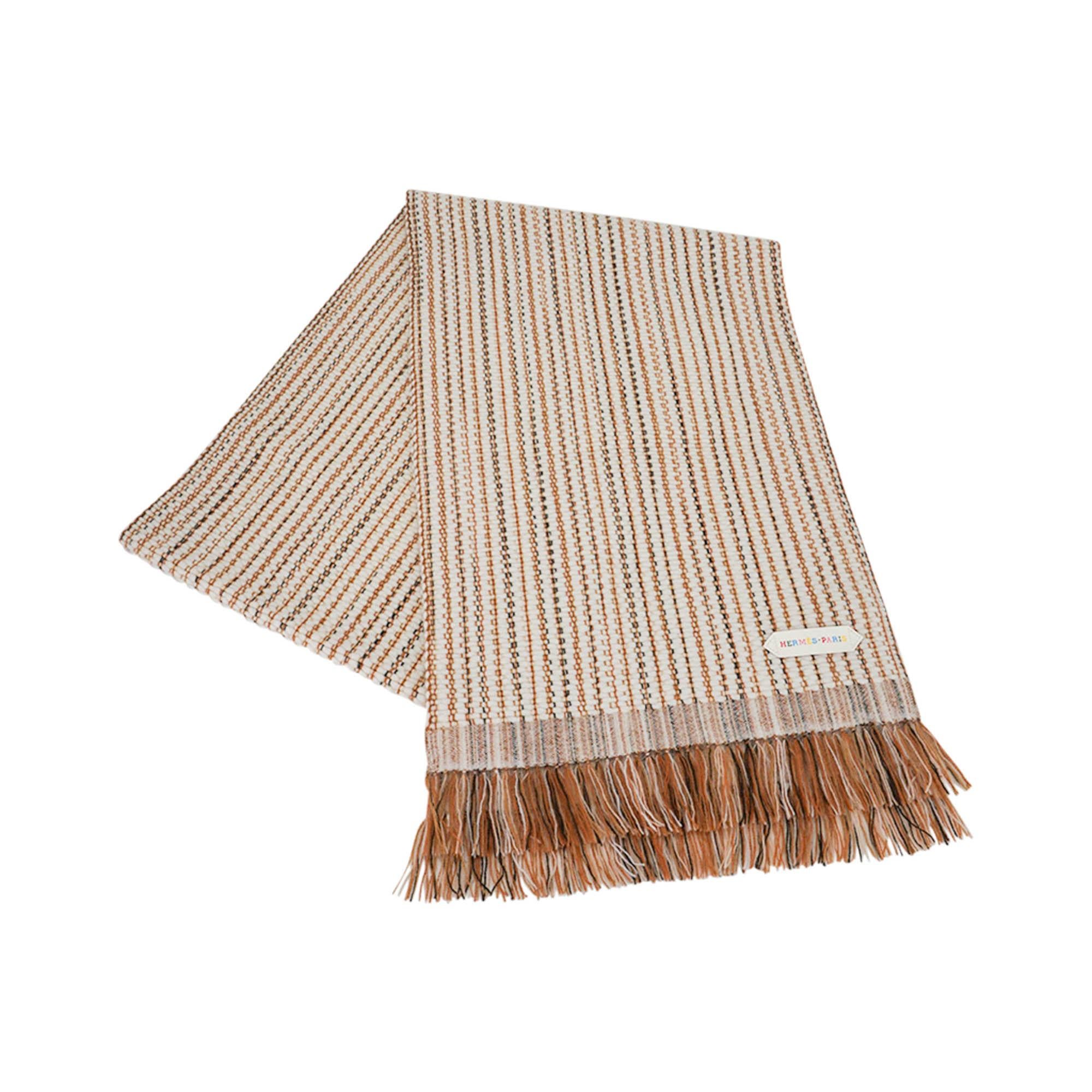 Mightychic offer a Limited Edition Hermes Boutis Cashmere fringe muffler featured in Ecru and Gold.
Inspired by the texture of boutis quilts it is a beautifully detailed weave.
Lambskin printed logo Hermes Paris.
Muffler has a 2