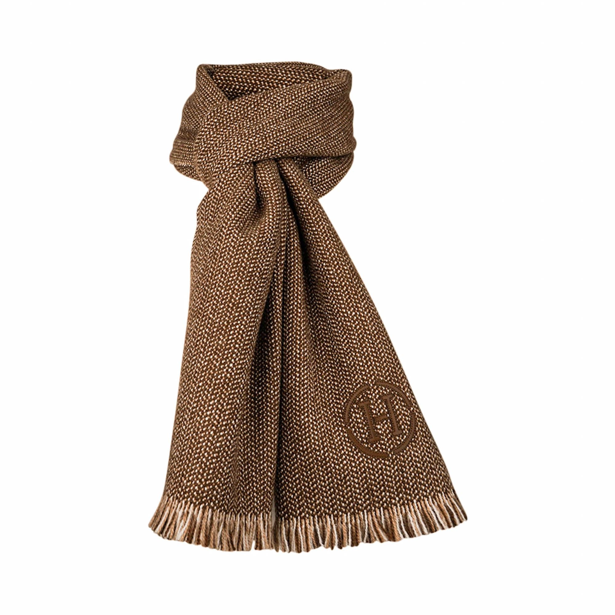 Mightychic offer an Hermes Granite Cashmere fringed muffler featured in Caramel, Camel and Ecru.
Embroidered logo Hermes Paris.
Tricolor weave gives a granite effect.
Muffler has a short fringe.
Can be worn as a muffler or neck scarf.
Made in