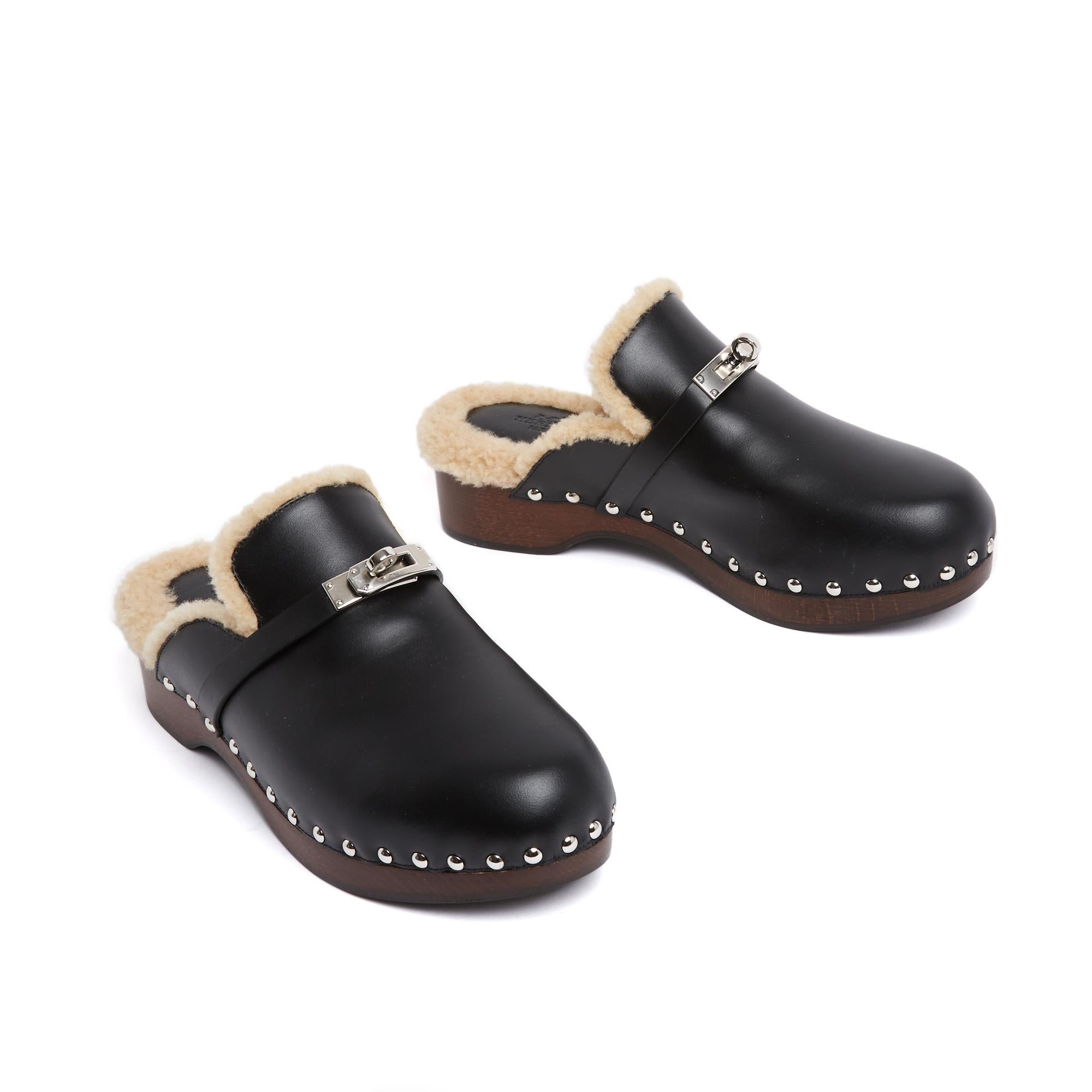 Hermès clogs mules Carlotta model in black leather and ecru 