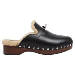 Hermès Mules Sabots Carlotta EU39 Schwarz Leder Shearling Clogs UK6 US8.5 Hermes