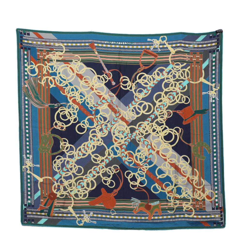 Presented by the House of Hermès, this scarf is a chic, lavish accessory you'll be happy to own! It has been tailored using multicolored silk fabric, which is embellished with the Brides et Gris-Gris print. It has a squared silhouette that measures