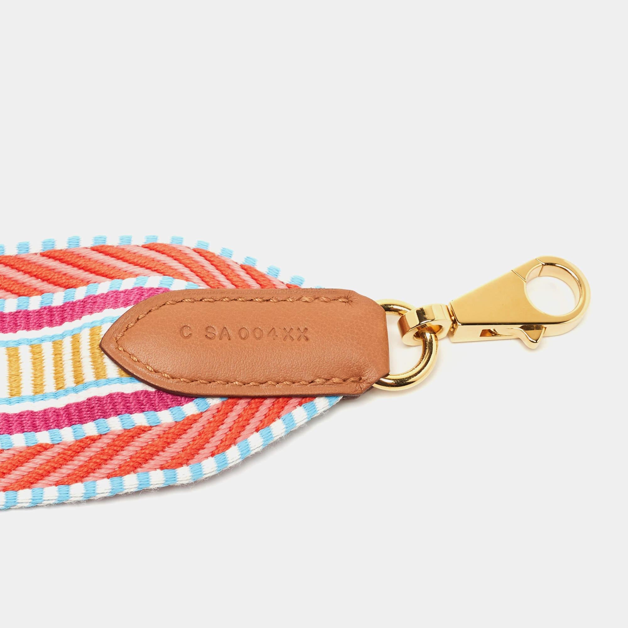 Color up your classy handbags with this bag strap from the House of Hermés. A luxurious accessory, this strap is super sturdy and easily complements any style.

Includes: Original Box