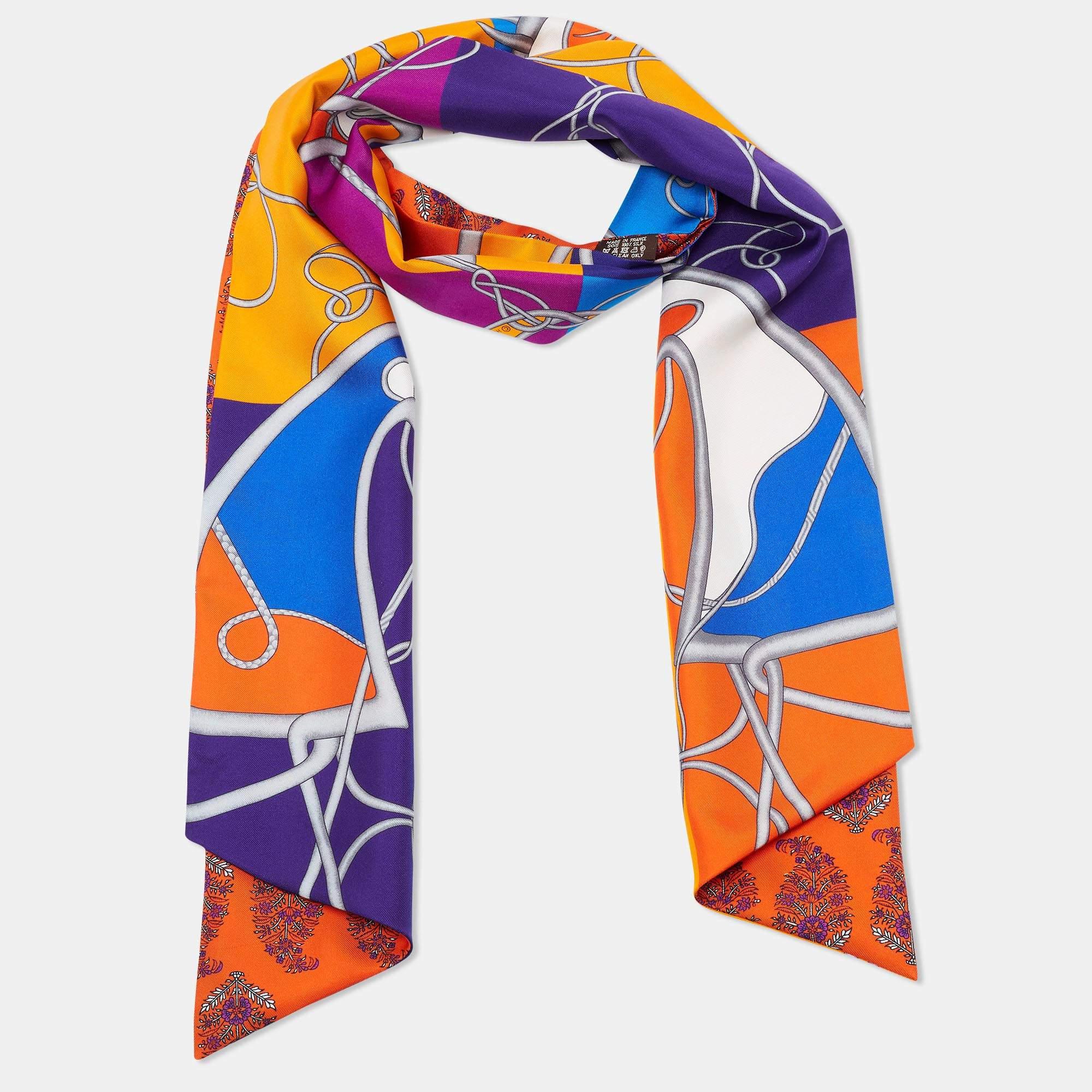 The Hermestwilly is a luxurious and vibrant accessory that effortlessly adds a touch of elegance to any outfit. Made from high-quality silk, this twilly features a stunning multicolored design and showcases the iconic Coup De Fouet motif. It can be