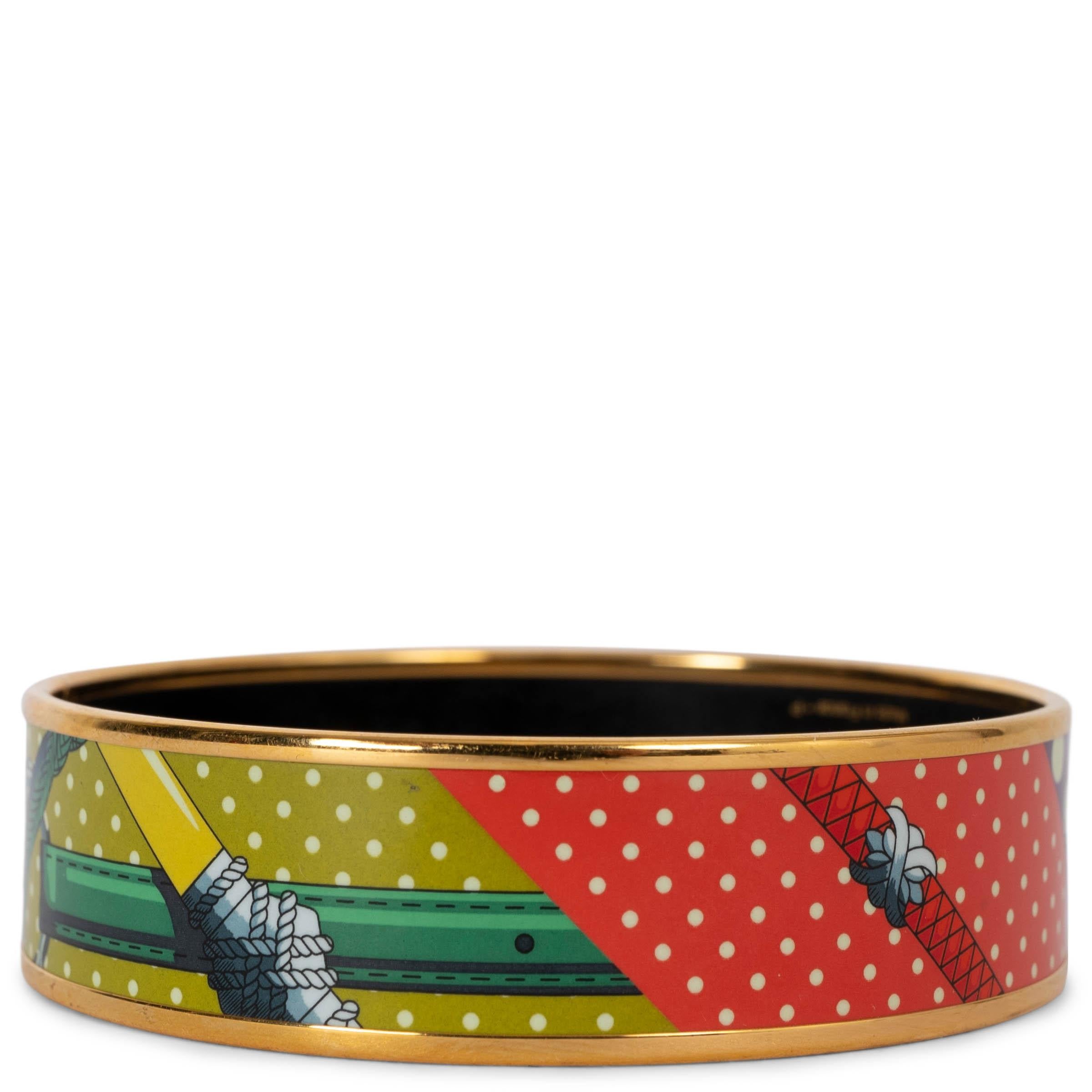 This 100% authentic Hermès Clic Clac à Pois wide bangle bracelet is crafted from purple, dark green, lime green, and coral enamel. It features gold-plated hardware, creating a vibrant and luxurious accessory that perfectly blends bold color with