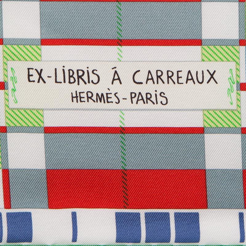 Hermes 'Ex-Libris a Carreaux' scarf in postachio, salmon, soldier blue, grey, red, white, apricot, pale pink, curry silk twill (100%) with bright green hem. Has been worn and is in excellent condition.

Width 90cm (35.1in)
Height 90cm (35.1in)