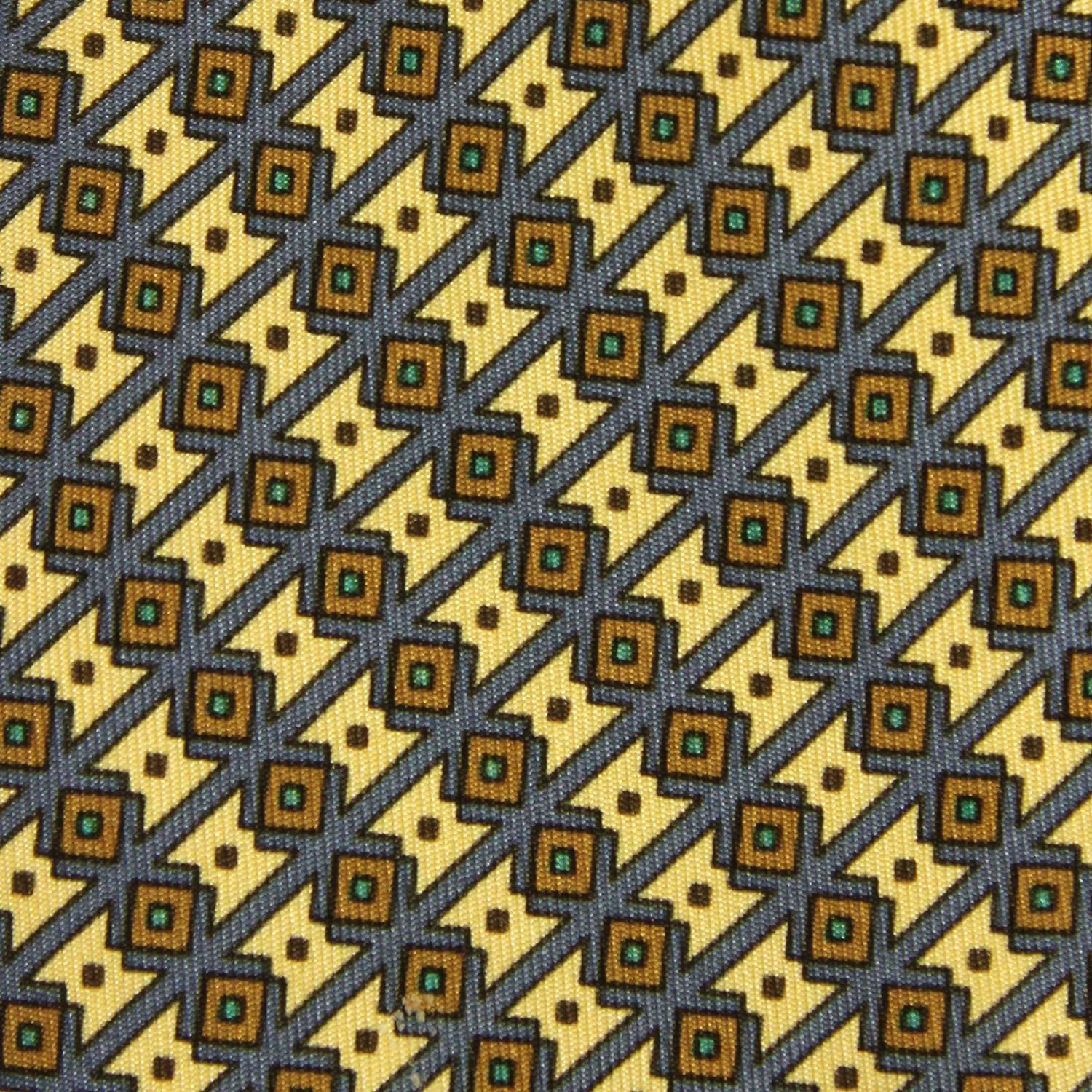 A.N.G.E.L.O. Vintage - Italy

Lively Hermès 100% silk printed tie with a geometric pattern in yellow and light blue colors. The item is vintage, it was produced in the 1990s and is in excellent conditions, flawless. Width: 7
