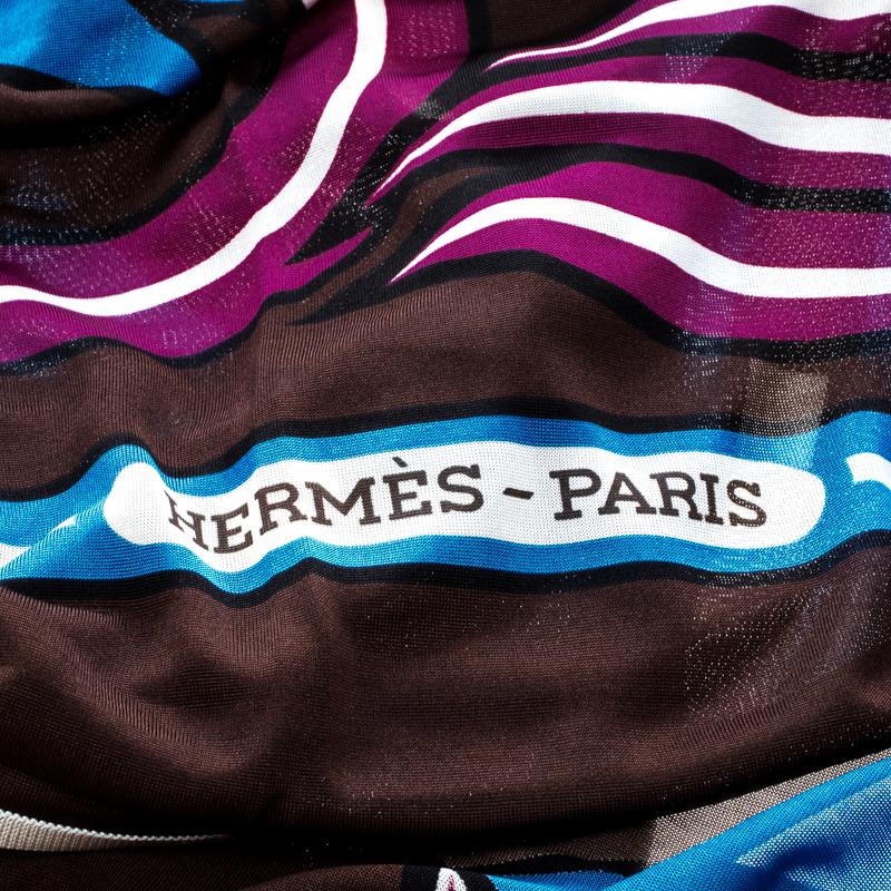 A prized buy for lovers of gorgeous scarves is this wonderful creation. This Hermes scarf, covered in prints and finished with hemmed edges, will change the way you accessorize. Go creative and start styling it with your bags or outfits.

Includes:
