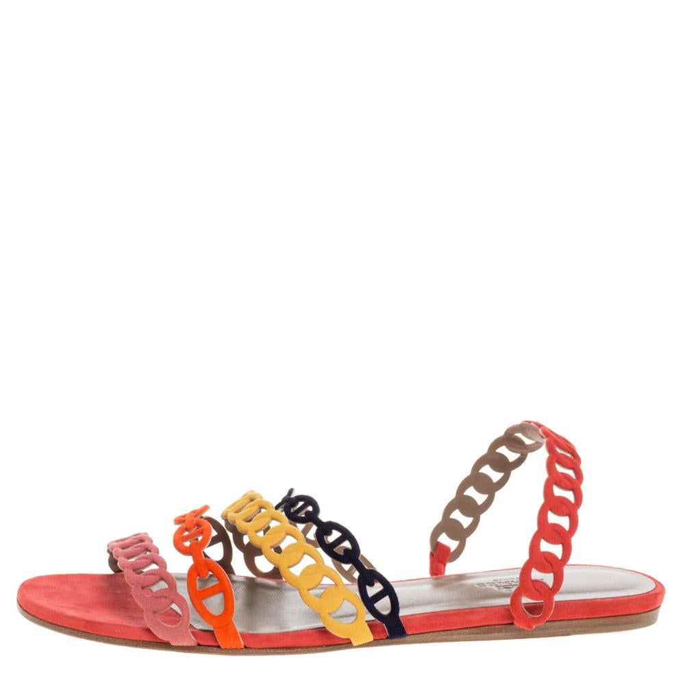 How stylish and chic do these D'ancre Chaine sandals from Hermes look! These sandals are crafted from suede and feature an open toe silhouette. They flaunt four straps across the vamps that resemble interlocking chains and come equipped with a