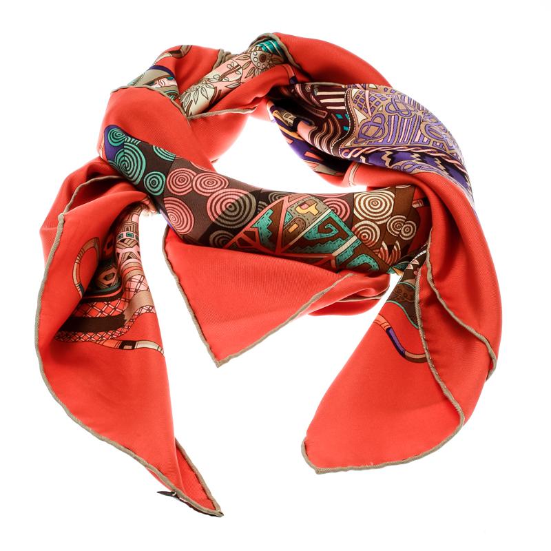 Hermes scarves are true on quality and style. This Voyage en Etoffes scarf is made of 100% silk. It features a multicolour printed pattern on its square expanse and is finished with a border along the edges. It is classy and can be styled in